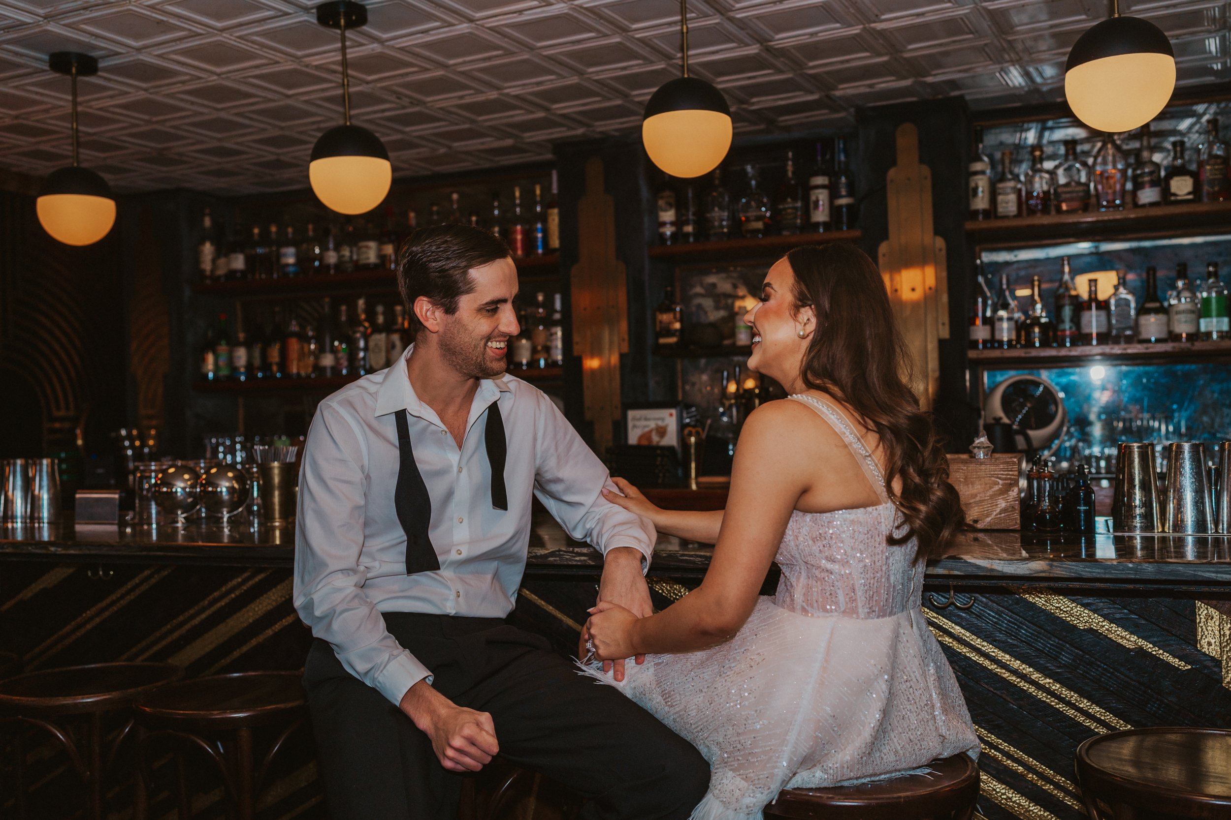 how to elope in Tennessee couple at cocktail bar celebrating elopement