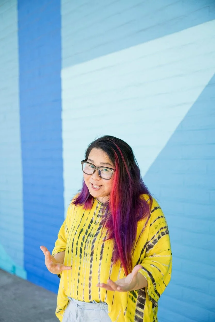 The image of LGBTQ BIPOC transgender counsellor in Burnaby posing to the camera, looking pensive to accompany a blog post about whether am I trans enough. The article is written by an LGBTQ therapist Burnaby running a counselling in Burnaby