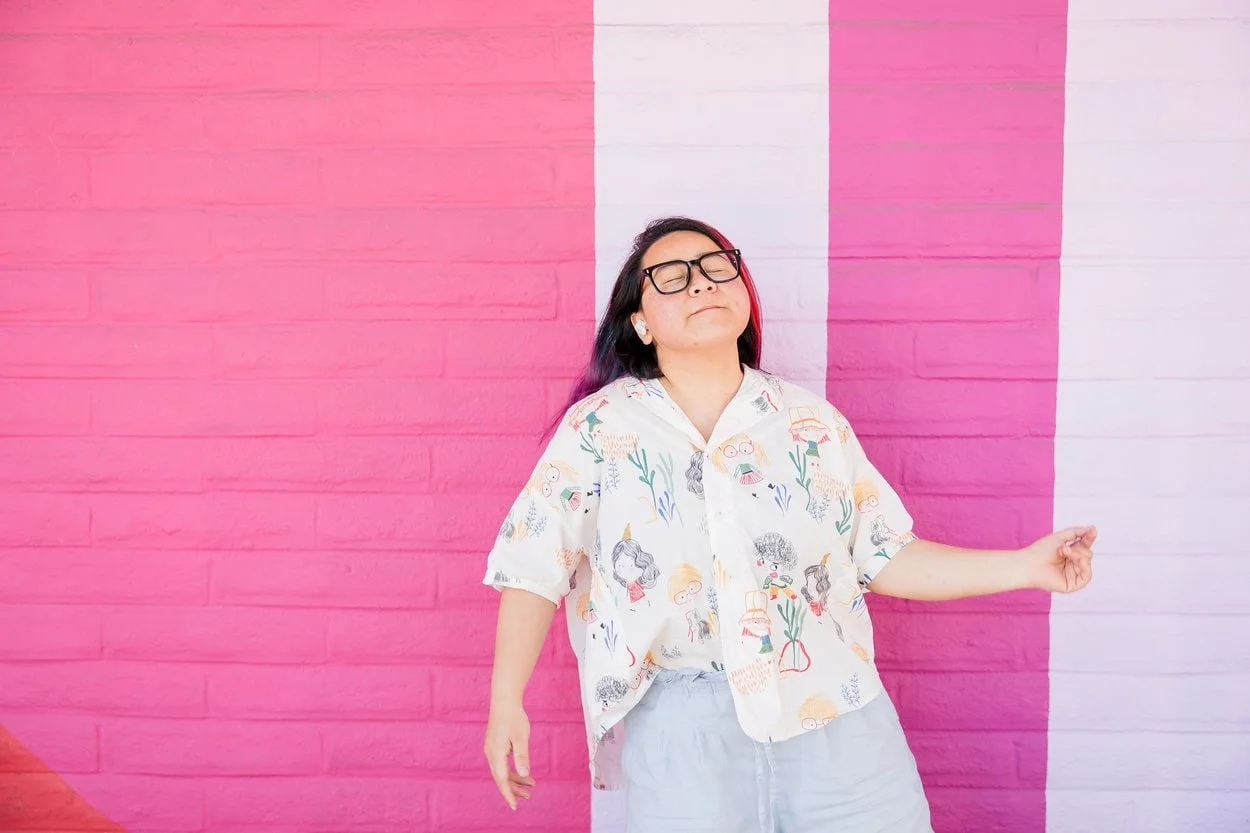 The image of LGBTQ BIPOC youth therapist Burnaby posing to the camera, looking friendly to accompany a blog post about what does it mean to be transgender. The article is written by an LGBTQ therapist Burnaby running a counselling in Burnaby