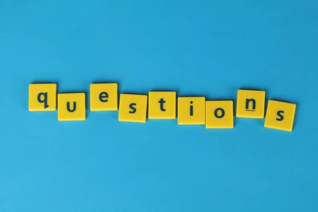 The image of a bunch of question mark to accompany a blog post about whether am I trans enough. The article is written by an LGBTQ therapist Burnaby running a counselling in Burnaby