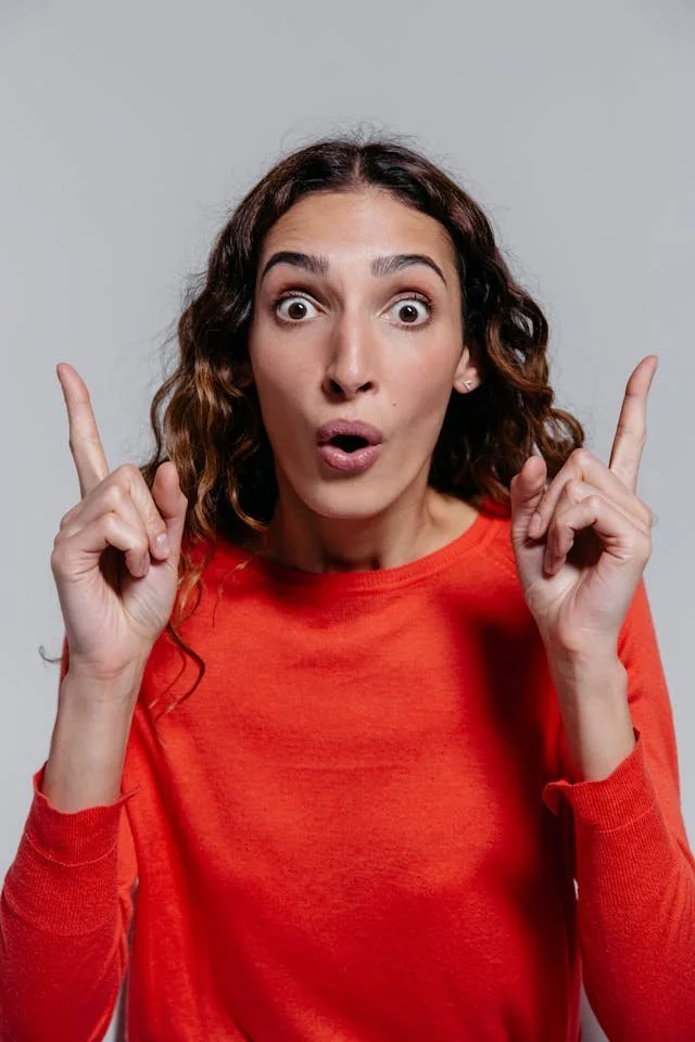 The image of someone with very animated expression to accompany a blog post about whether am I trans enough. The article is written by an LGBTQ therapist Burnaby running a counselling in Burnaby