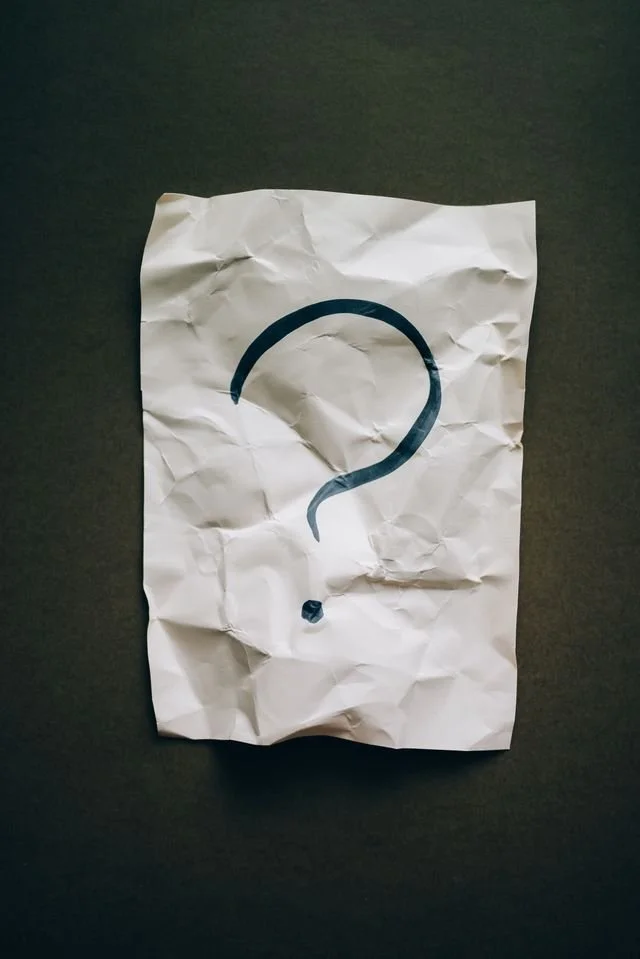 The image of a question mark to accompany a blog post about whether am I trans enough. The article is written by an LGBTQ therapist Burnaby running a counselling in Burnaby