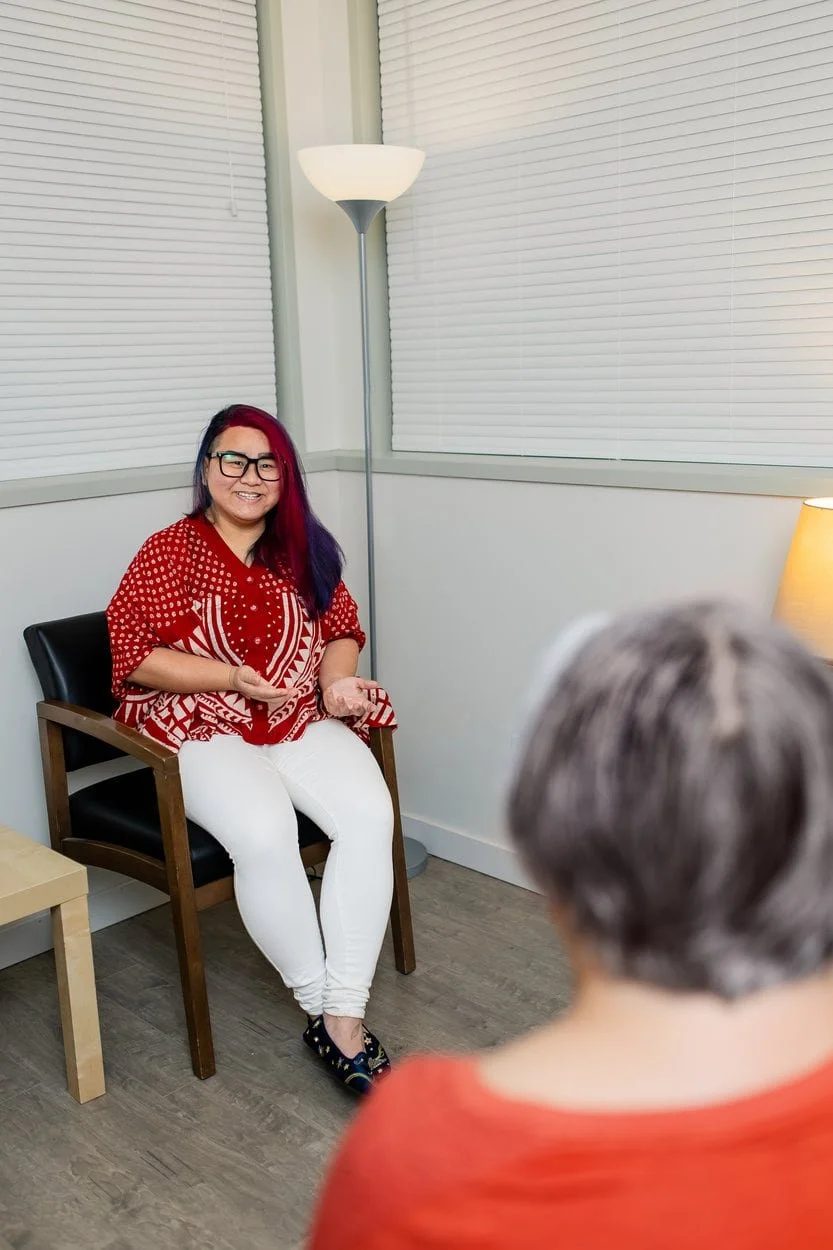The image of a bipoc, queer, youth, transgender therapist Vancouver sitting in an office to accompany a landing page about ADHD therapy