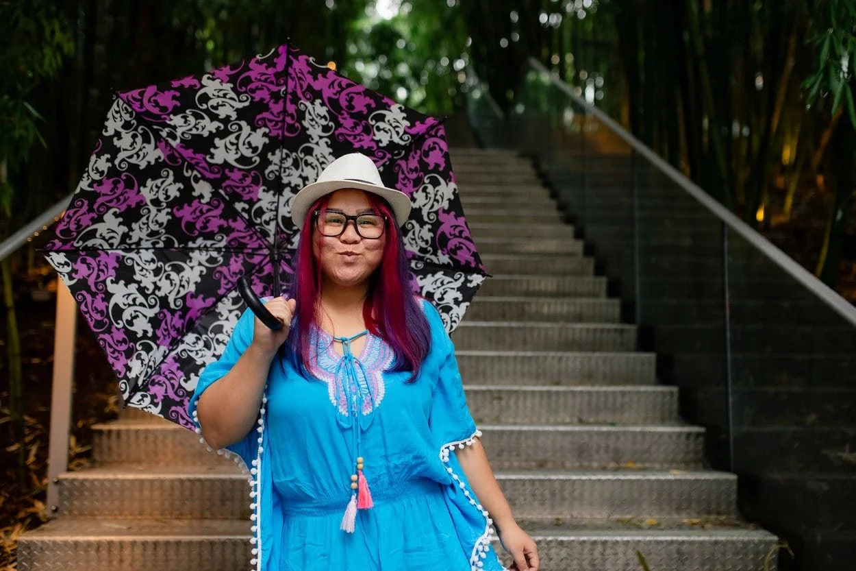 The image of LGBTQ youth BIPOC therapist Burnaby posing to the camera to accompany a blog post about genderqueer discovery