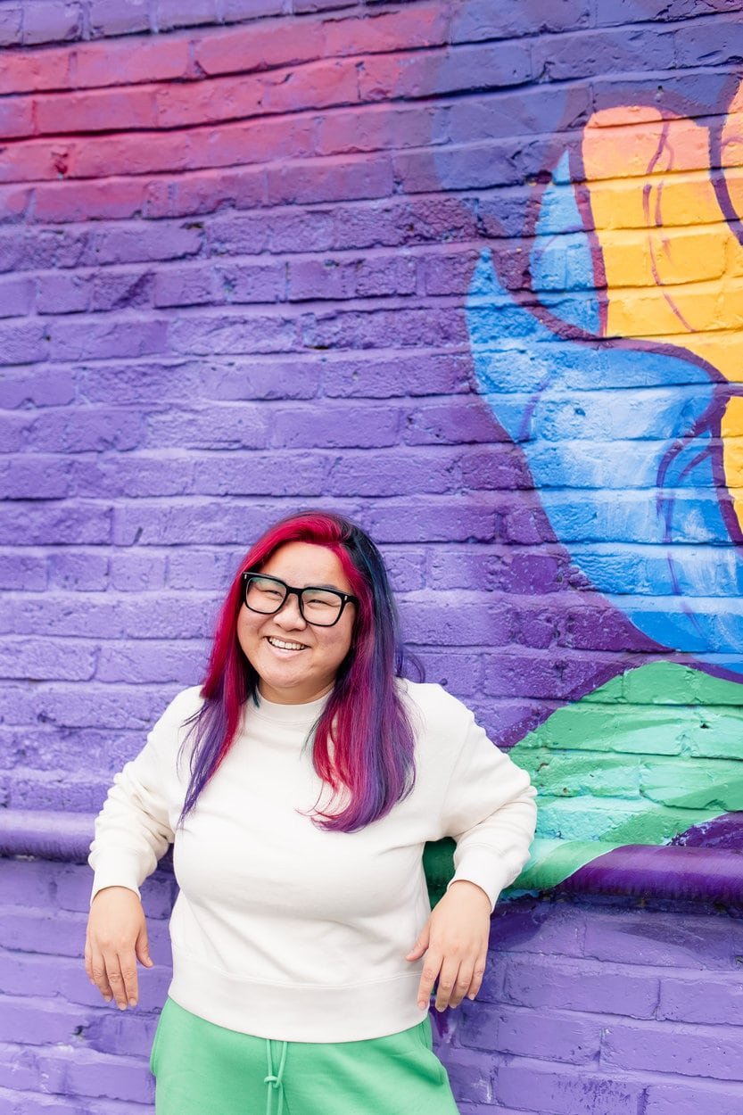 The image of LGBTQ BIPOC transgender counsellor in Burnaby posing to the camera, looking pensive to accompany a blog post about whether am I trans enough. The article is written by an LGBTQ therapist Burnaby running a counselling in Burnaby