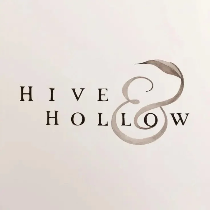 The words "HIVE HOLLOW" with a stylized snake forming the ampersand between them.