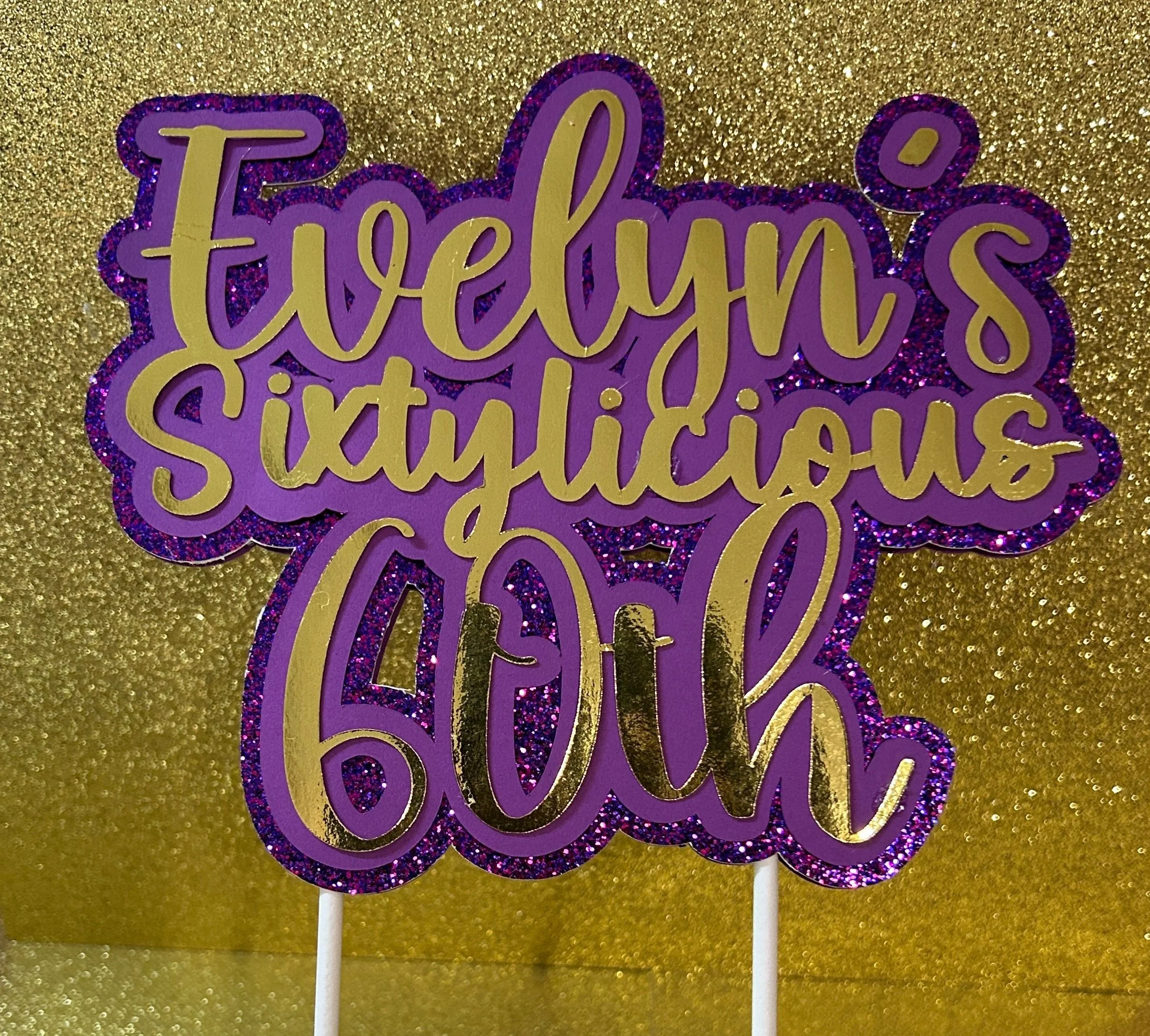 Purple and gold glittery sign with 'Evelyn's Sixtylicious 60th' on a gold background.