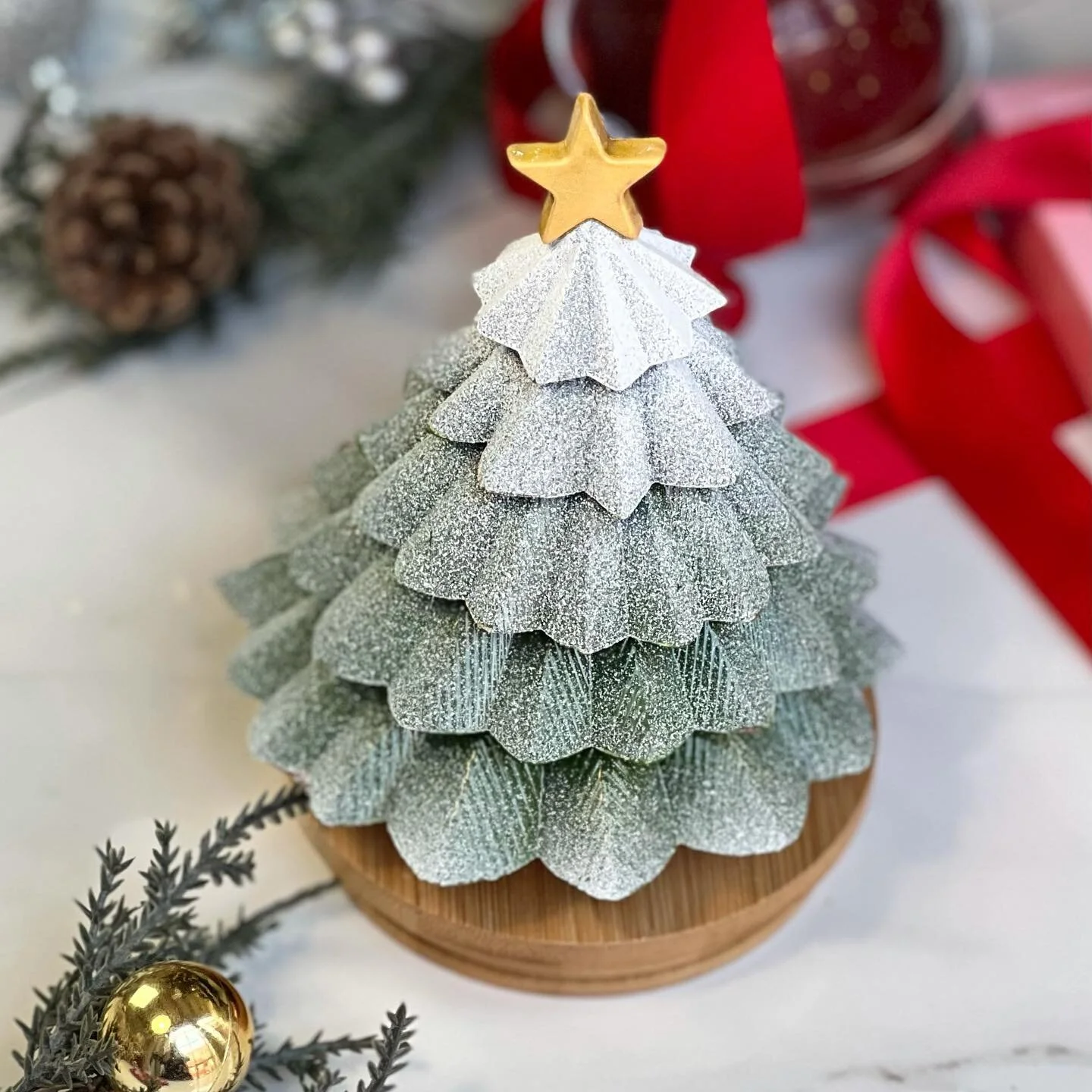 🎄This Chocolate Christmas tree is filled with crunchy caramelized hazelnut gianduja  Perfect to share with your friends and family around the dinner table. I will only have a few of these available @maum.market in Pasadena and then I will be making 