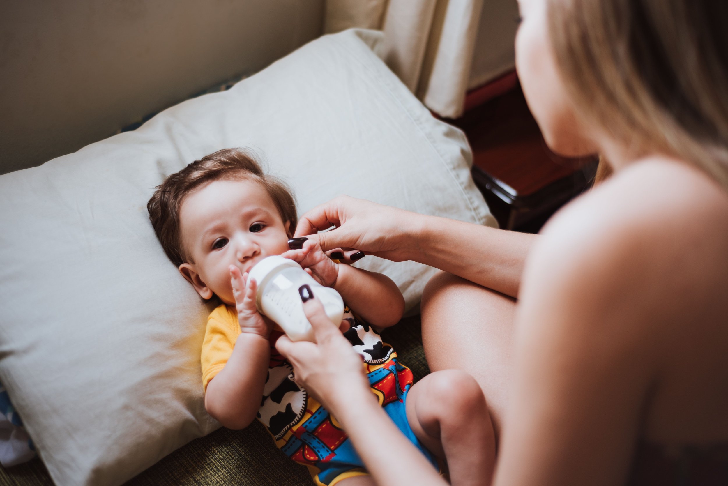 When Do Babies Hold Their Own Bottle? (Timeline & Safety Milestones)