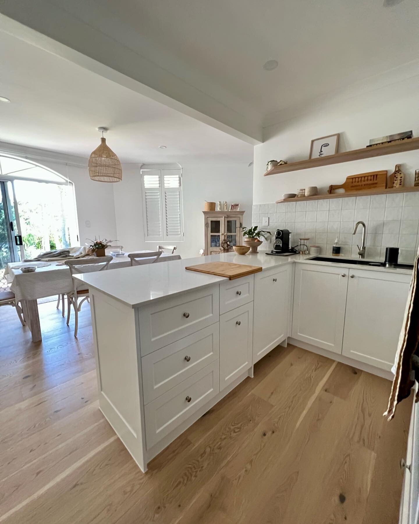 Kitchen from our mermaid waters town house project recently completed featuring 2pac shaker joinery stone Benchtops and engineered oak timber floor boards to finish it off