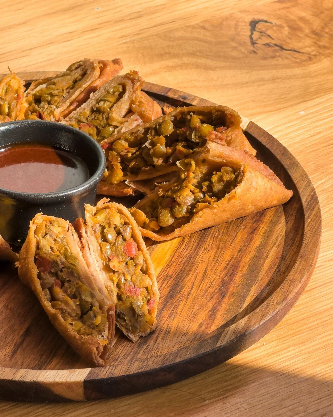 Always reaching for Sambussas 🙌⁠
⁠
Our Sambussa Sampler features a taste of all 5 of these delicious fried dumplings including Chicken, Beef, Spinach, Cheese and Lentil. They're served with a sweet and spicy honey awaze sauce for dipping.⁠
⁠
⁠
⁠
⁠
#