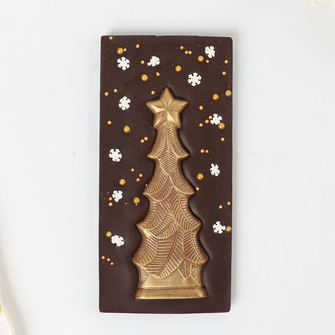 Delicious Dark Chocolate Bar with a Christmas Tree Ornament for Christmas