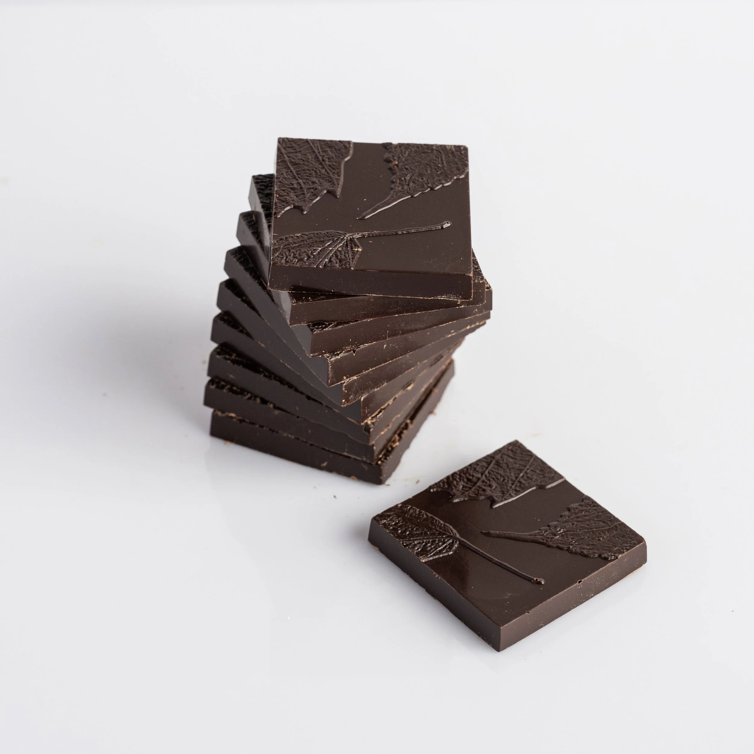 Premium chocolate tasting squares in Belgian dark chocolate containing 70% cocoa content.