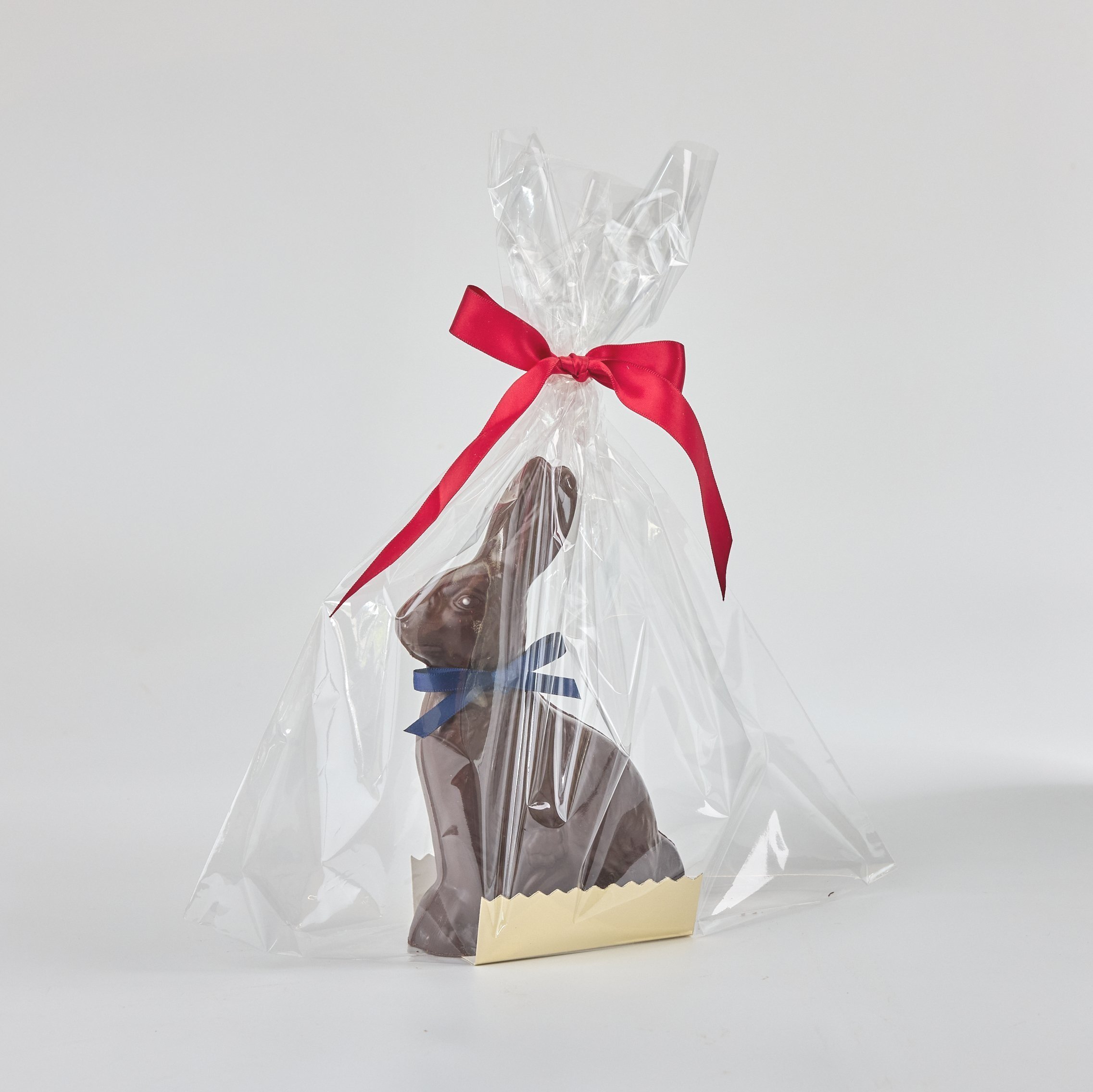 Handcrafted chocolate bunnies for Easter! 18cm tall, made using the finest Belgian couverture in white, milk, and dark chocolate. Perfect gift for Easter.