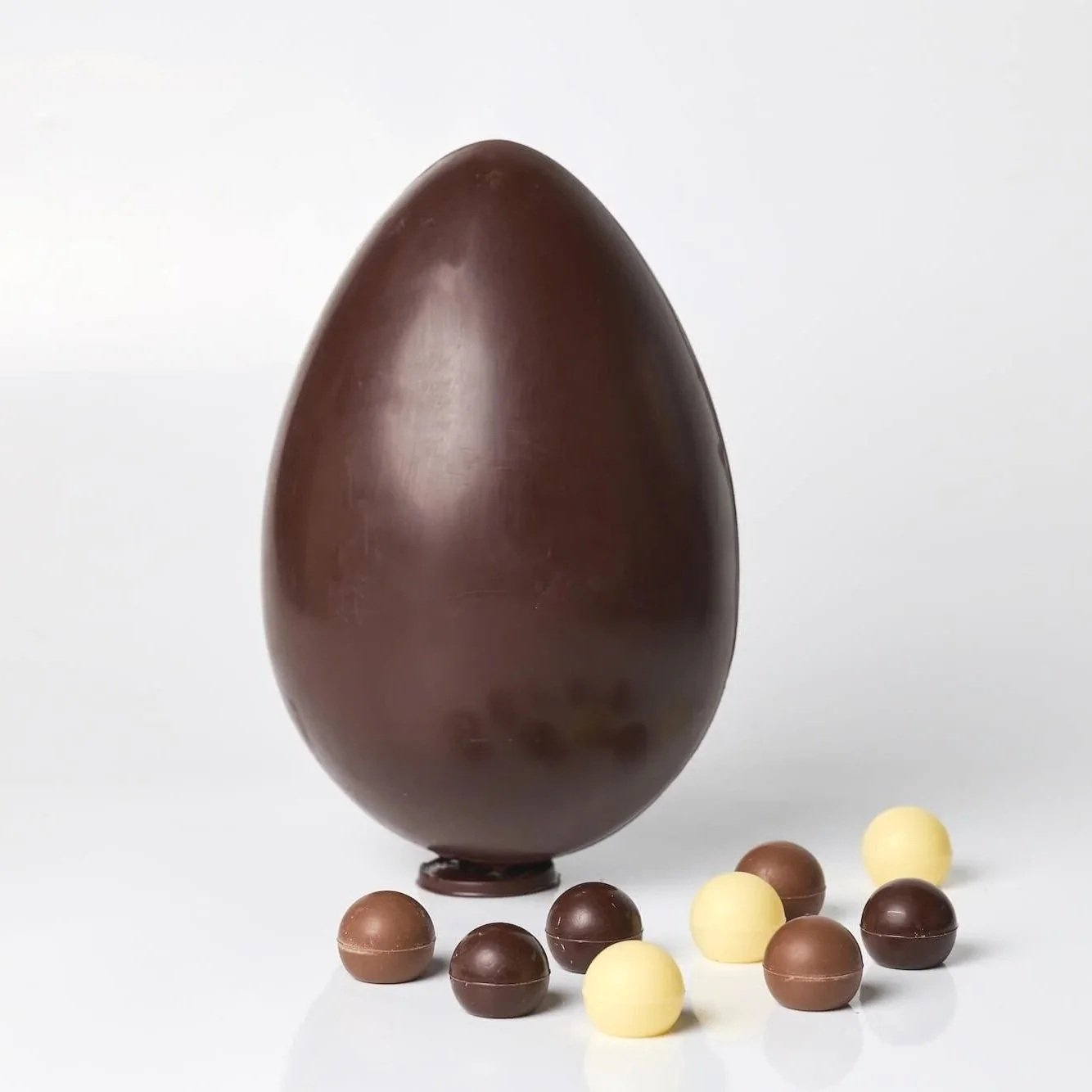 large dark chocolate easter egg with ganache filled chocolate truffles, perfect easter gift for dark chocolate lovers, singapore 2026