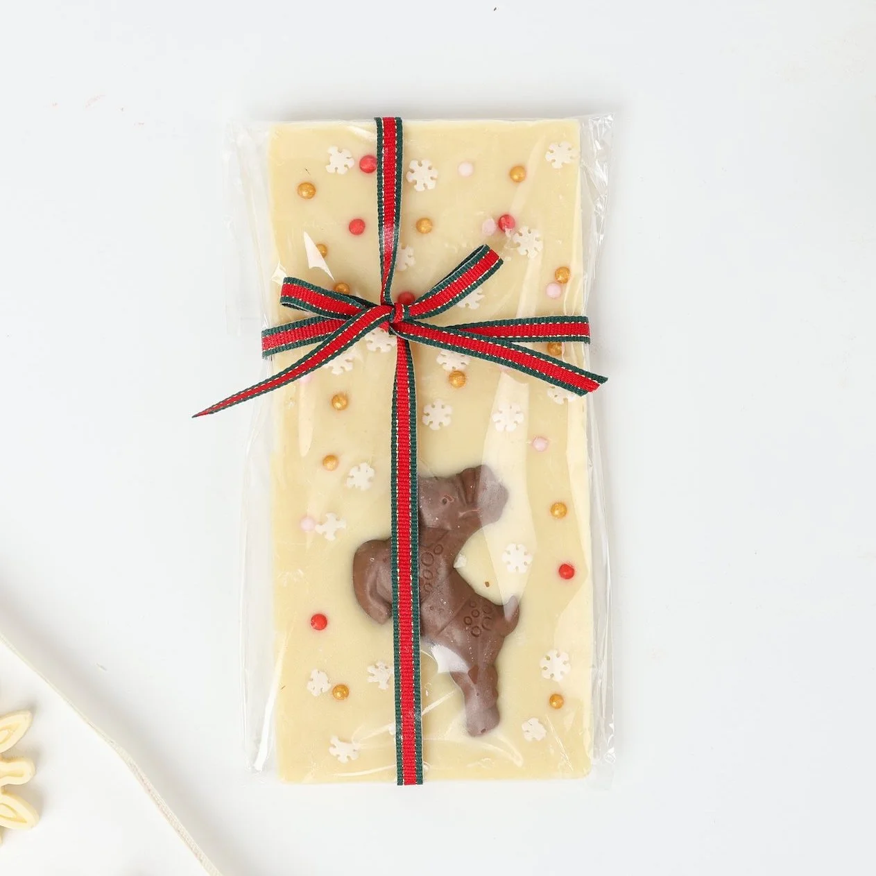 Creamy White Chocolate Bar with a Milk Chocolate Reindeer for Christmas