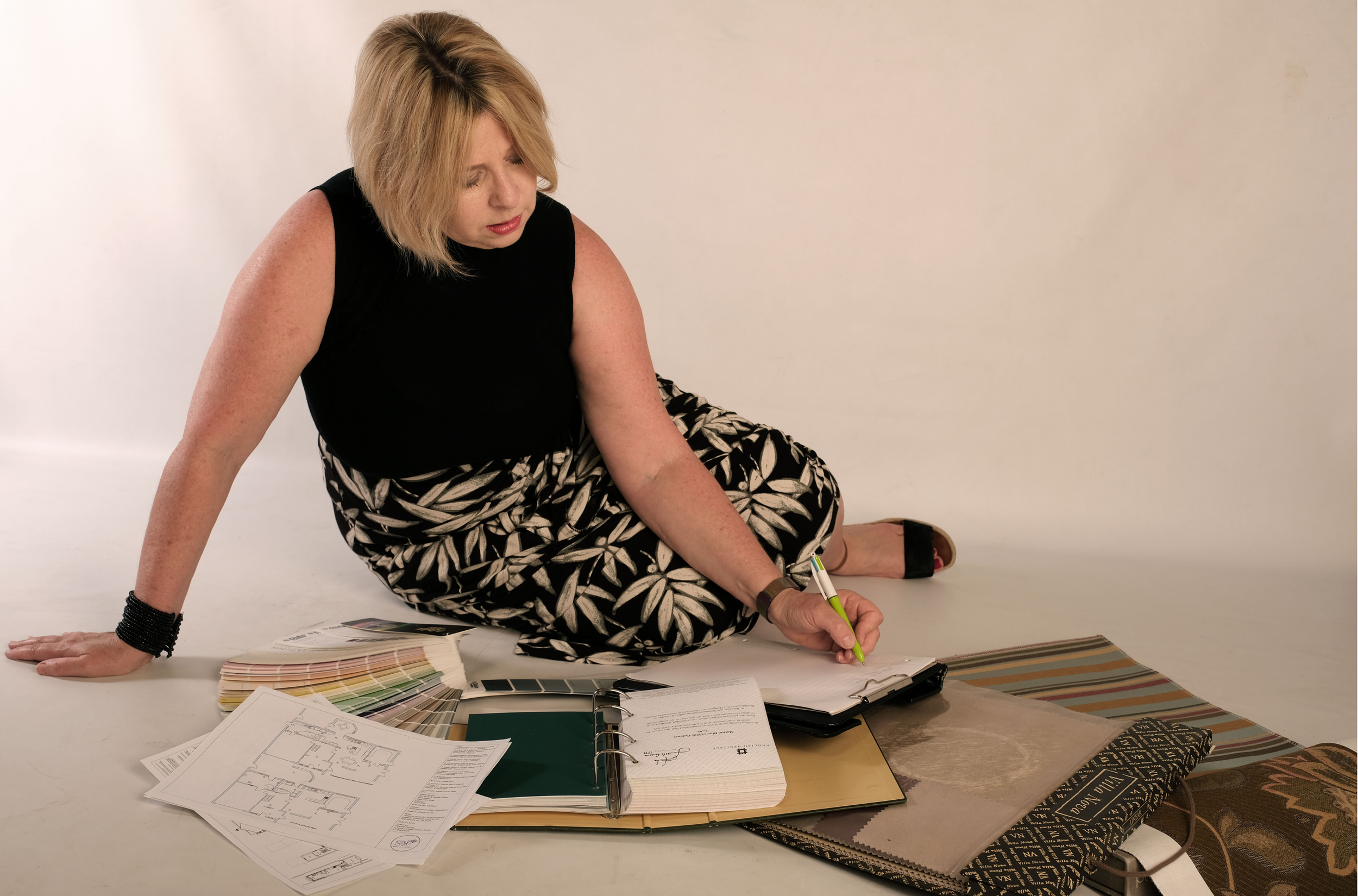Interior designer Chantal Thomas developing a full interior design scheme with plans, fabrics and material samples.