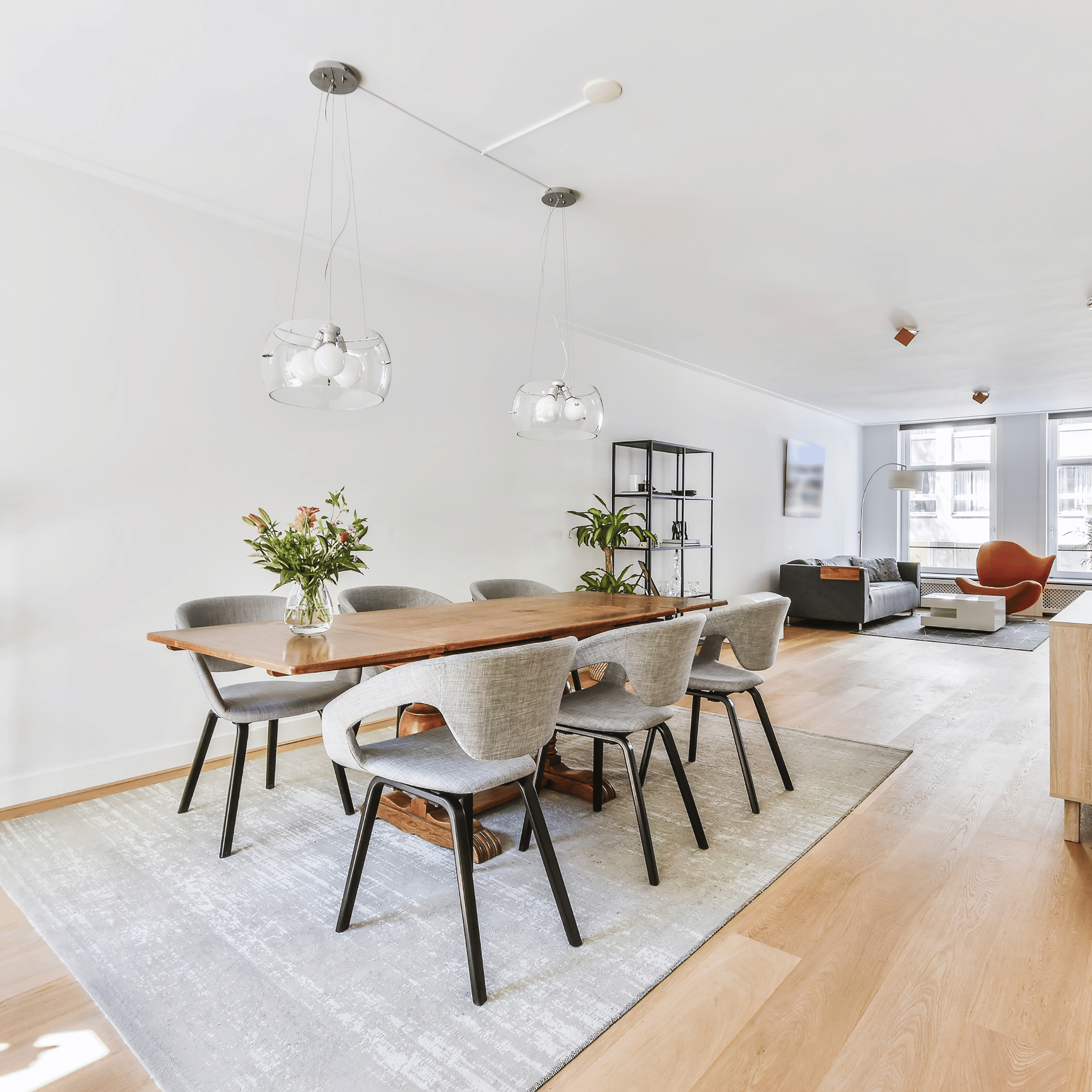 This is the everyday-life image. It shows the dining area as part of a larger living space and supports the idea that dining spaces need to work for real life.