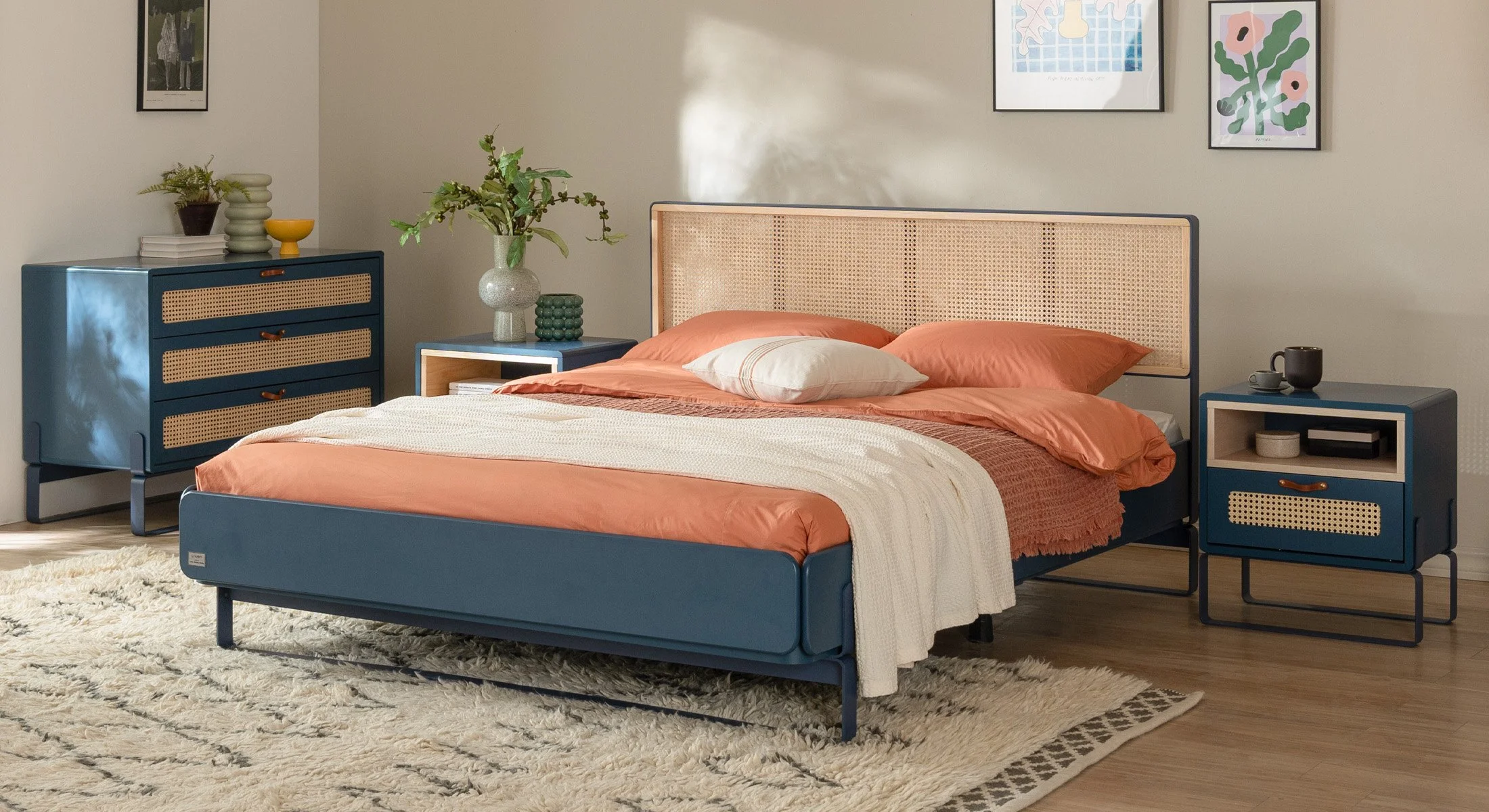 Side view of the Minimal bedroom collection, emphasizing the warmth of the wood and the clean silhouette.