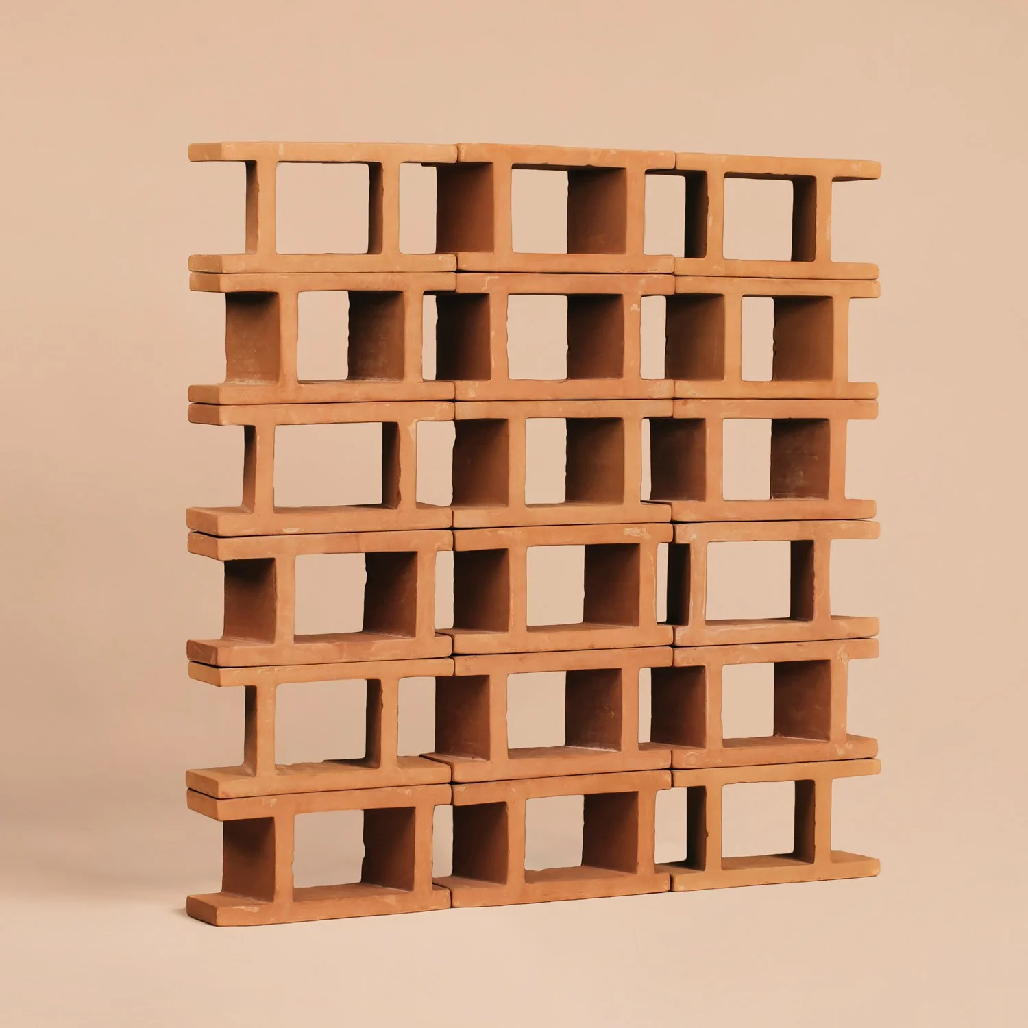 A geometric wall tesselation using Casares modules highlighting the slanted inner walls designed to guide airflow.