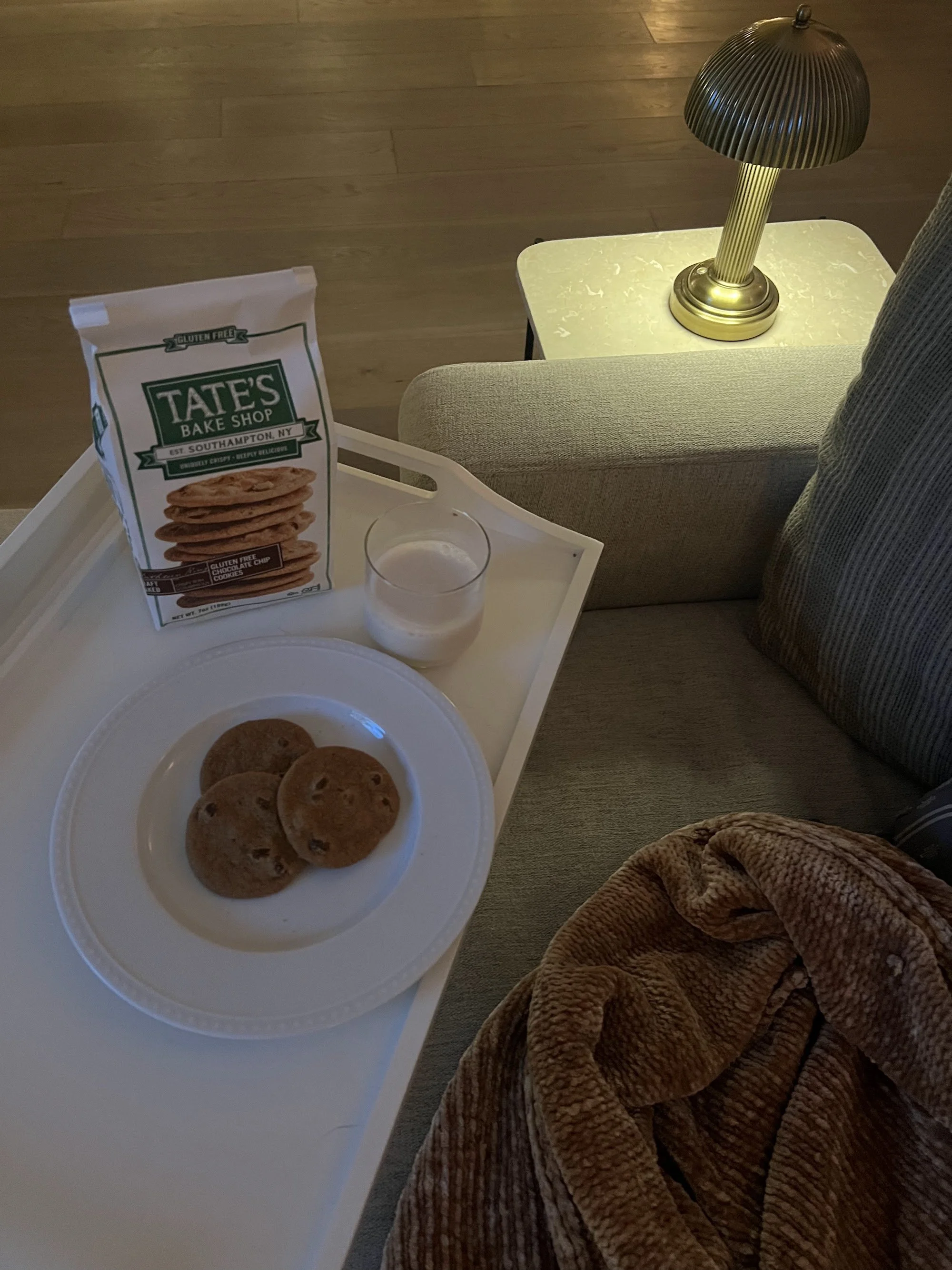 Tate's Bake Shop cookies with a glass of milk on a serving tray, a Tate's Bake Shop x MALK campaign still by Homemade Social