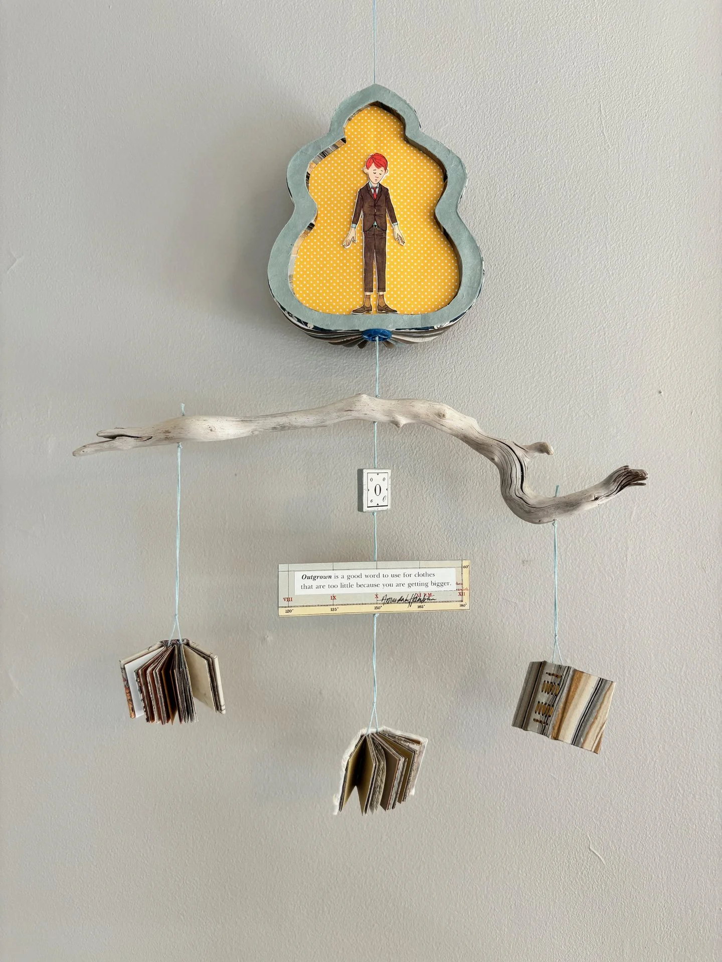 Amanda Hamblin, "Shrinking Oliver," mixed media, 38 x 14 inches.