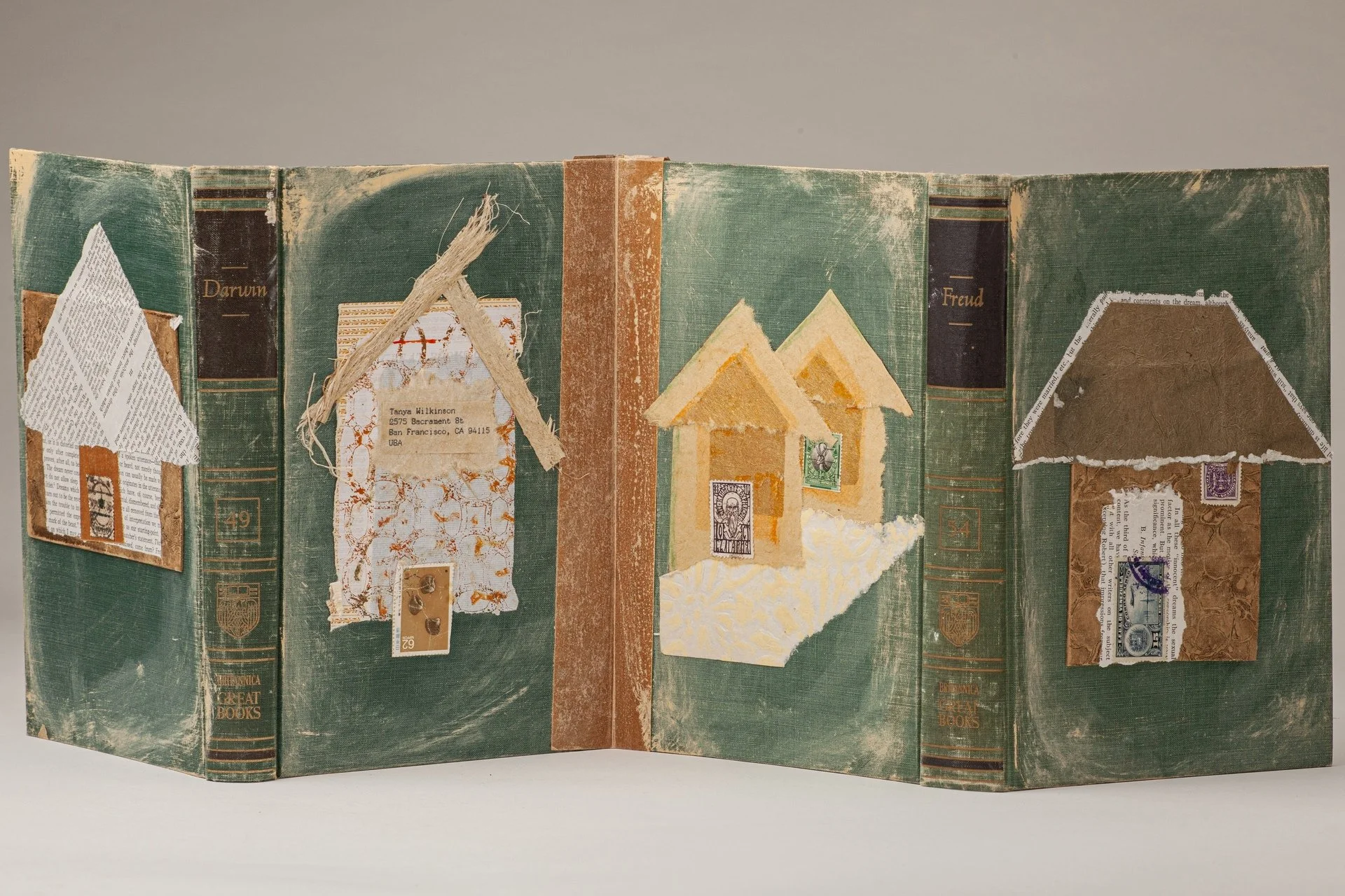 Tanya Wilkinson, "Sacramement Street: Houses of Healing," altered book, 10 x 24 x .5 inches.
