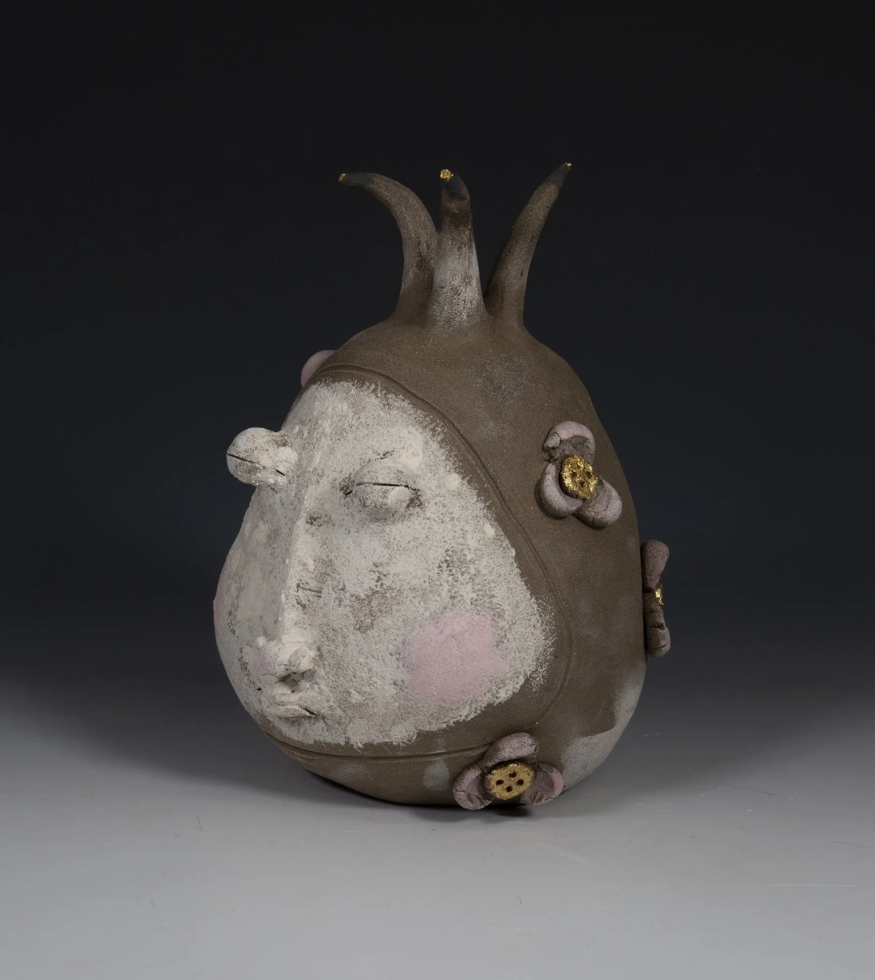 Chavarria Boardman, "Lady Button," ceramic and gold leaf, 8.5 x 5.5 x 6.5 inches.