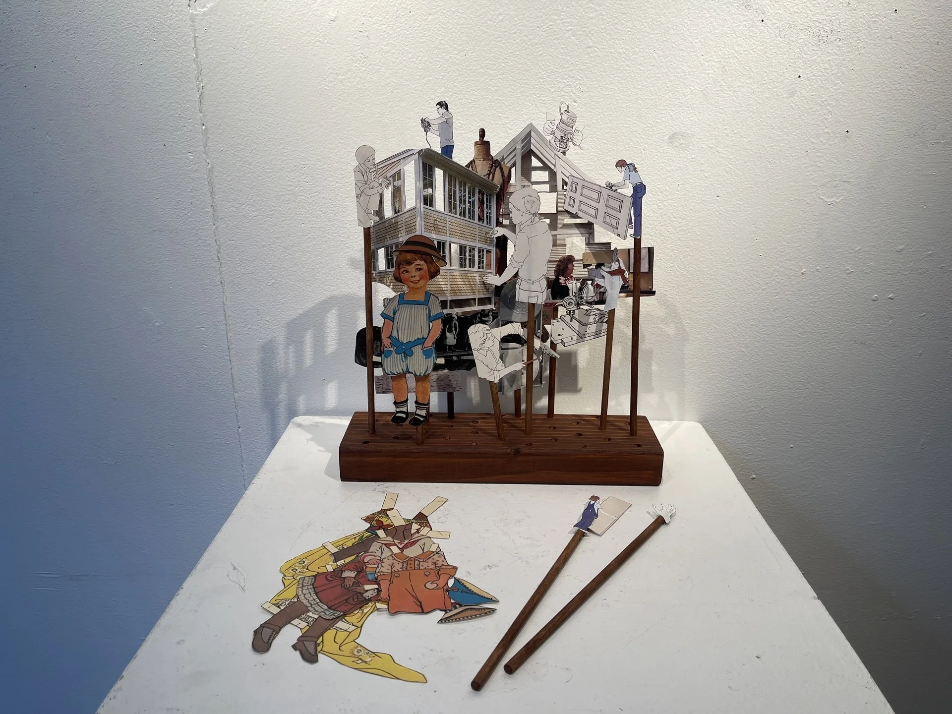 Jamie Weinfurter, "Buck the Trend," interactive paper scollage, 12 x 12 x 14 inches.