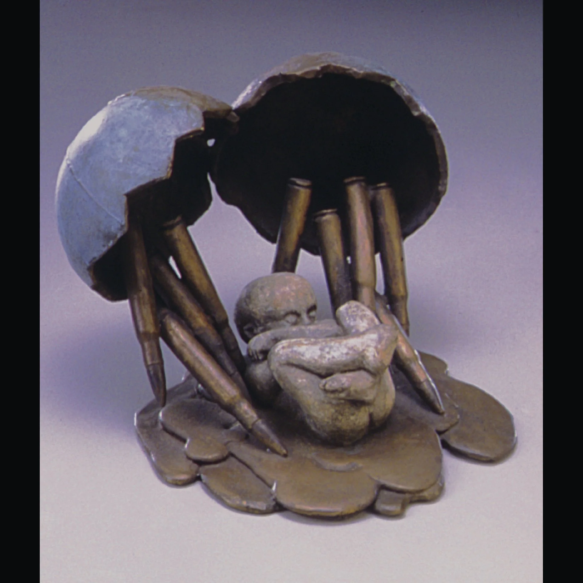 Leitha Thrall, "Baby Barely Born Bombarded by Bullets," bronze, 7 x 7 x 5.25 inches.
