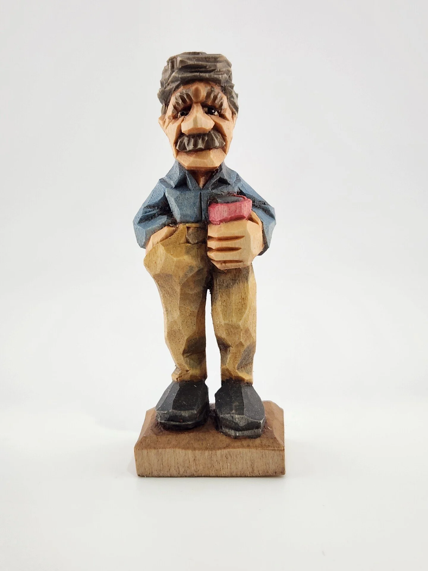 William Todd Martin, "Sippin'," basswood and acrylics, 4 x 1.5 x 1 inches.