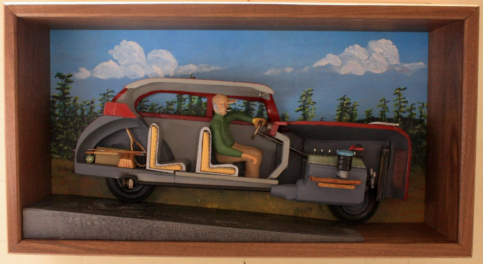 Steven C. Meyer, "Cross-Section: My Grampa Hoot Meyer on the Way to the River," wood, paint, glass and metal, 10.5 x 20.5 x 5.5 inches.