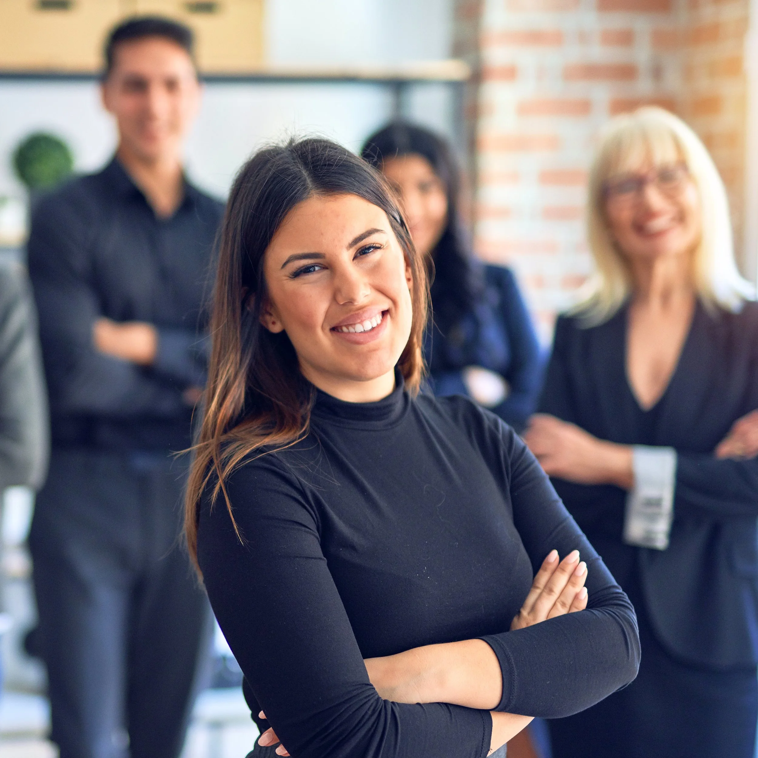 New leader speaking with team during a leader assimilation session focused on clarity and trust.