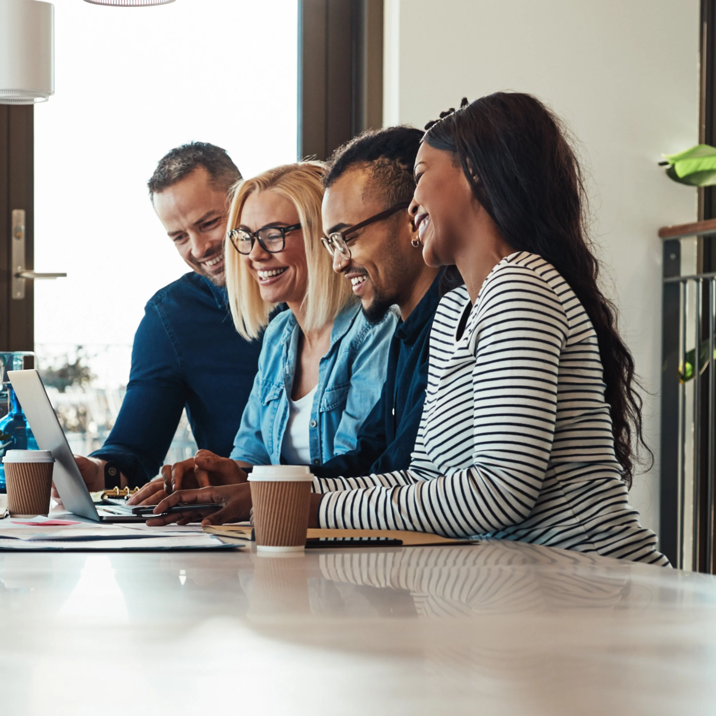 Team participating in cohort coaching session to reinforce accountability and follow-through.