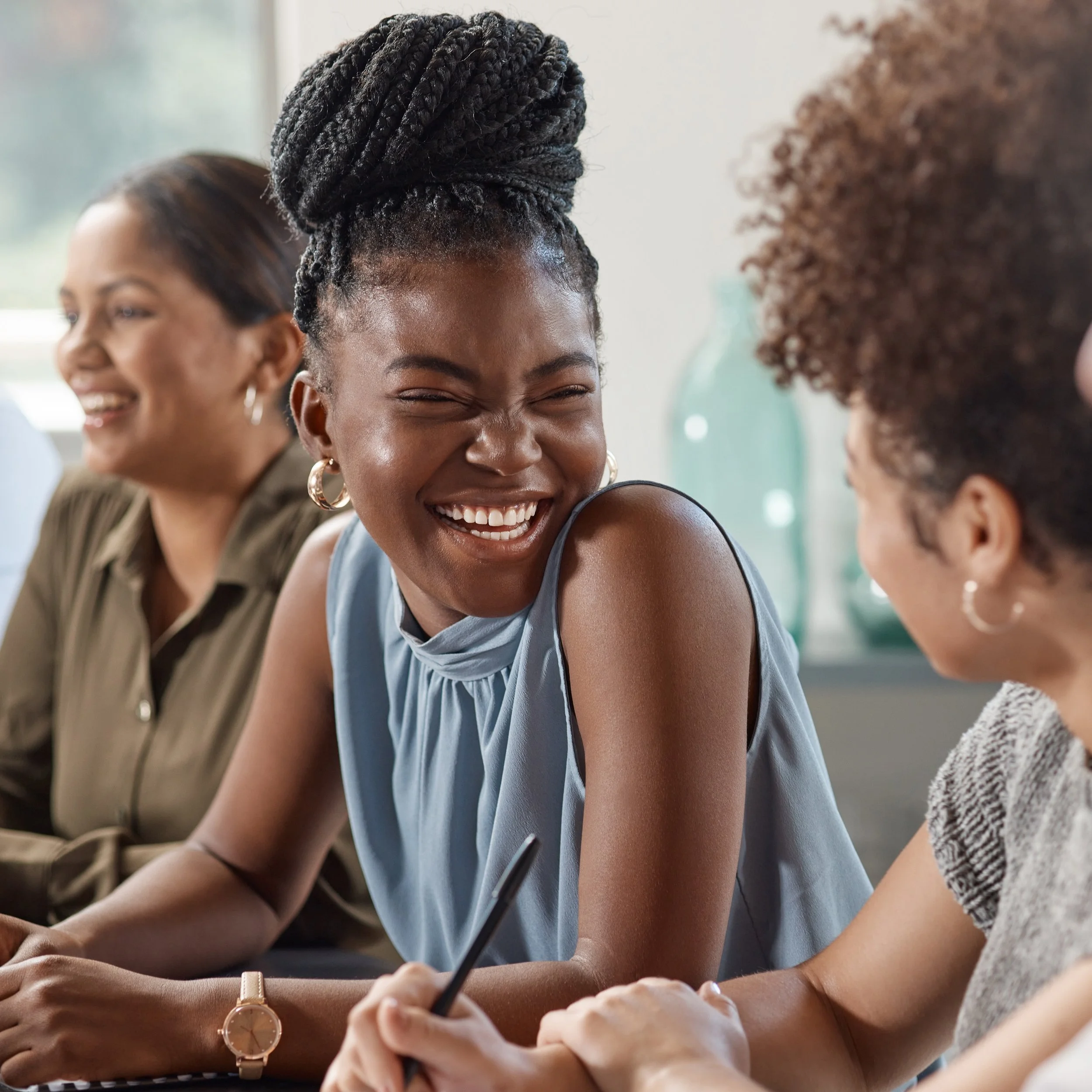 Team collaborating to align goals and strategic priorities during a strategy session.
