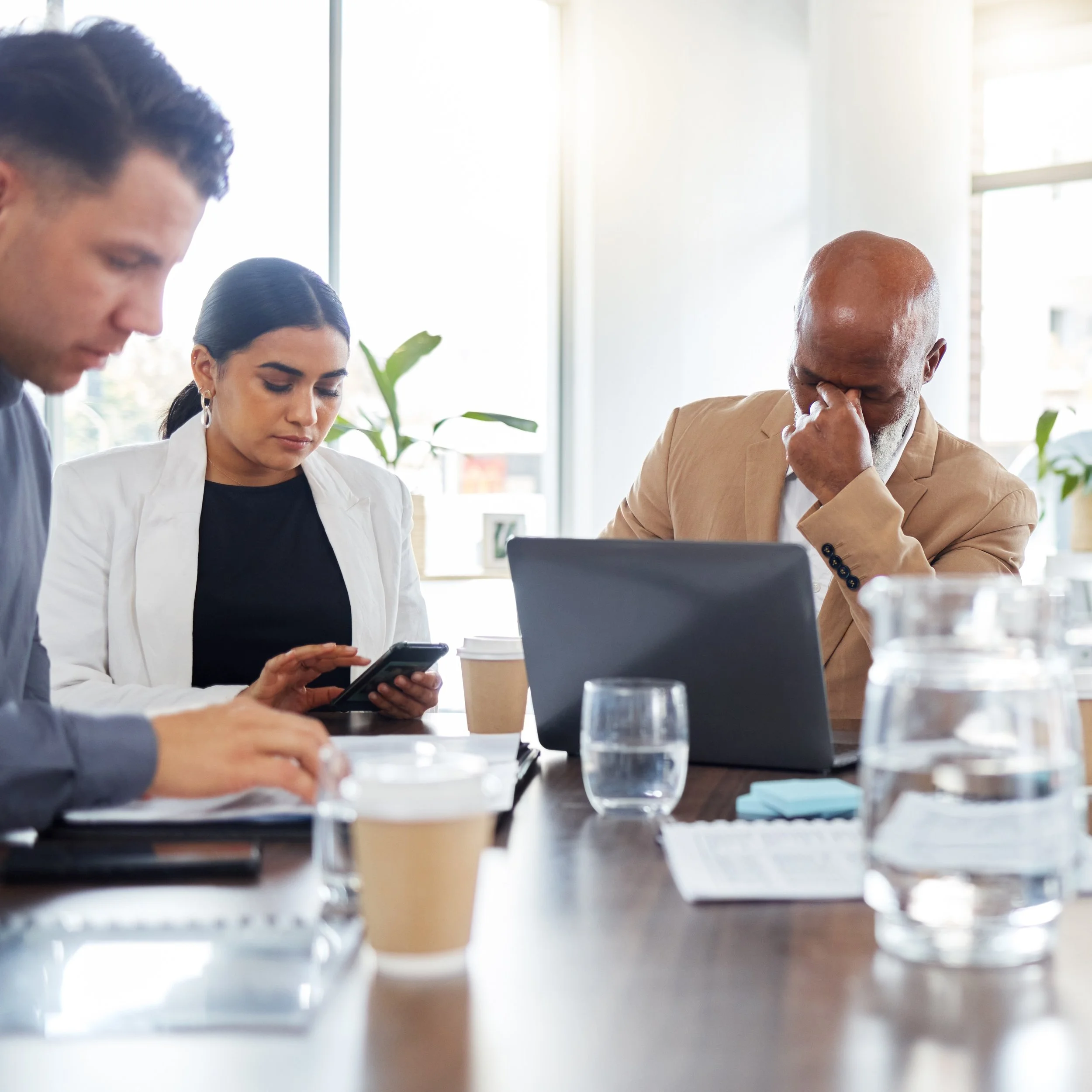 Team disengaged during strategy discussion, illustrating strategy drift