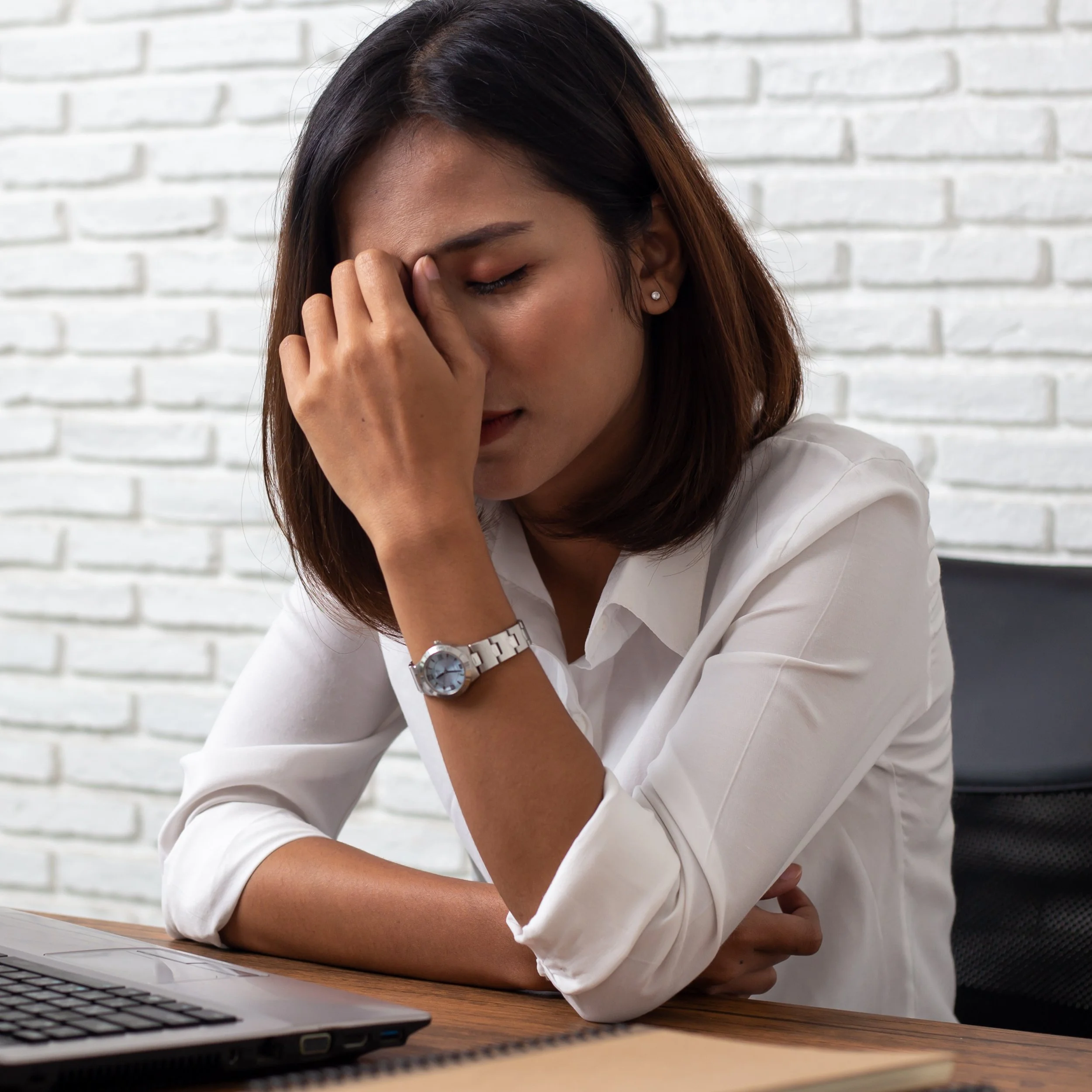 Professional experiencing change fatigue amid shifting organizational priorities