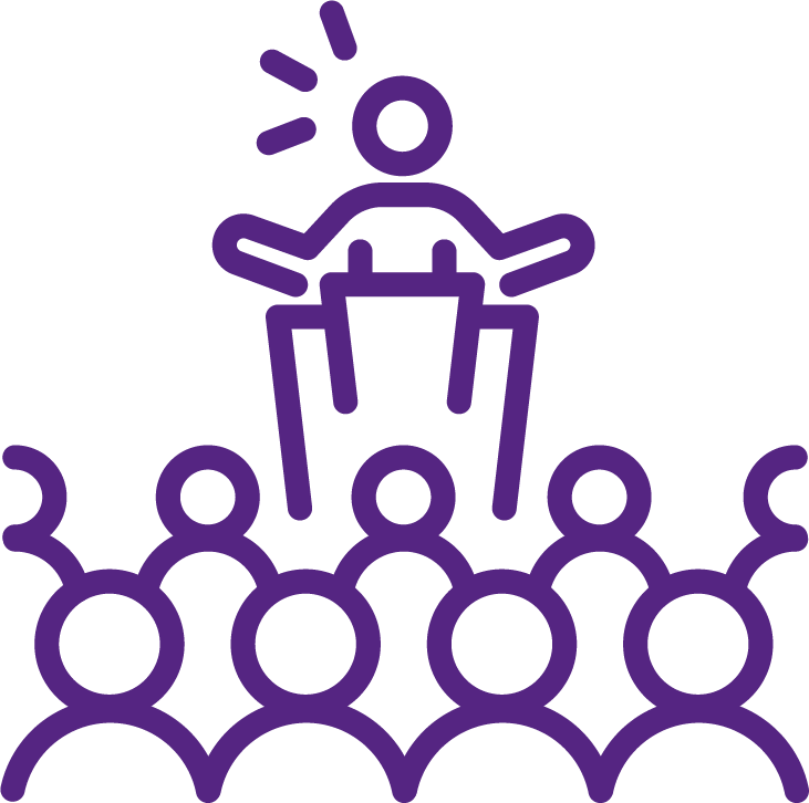 Participants engaged in in-person leadership training session