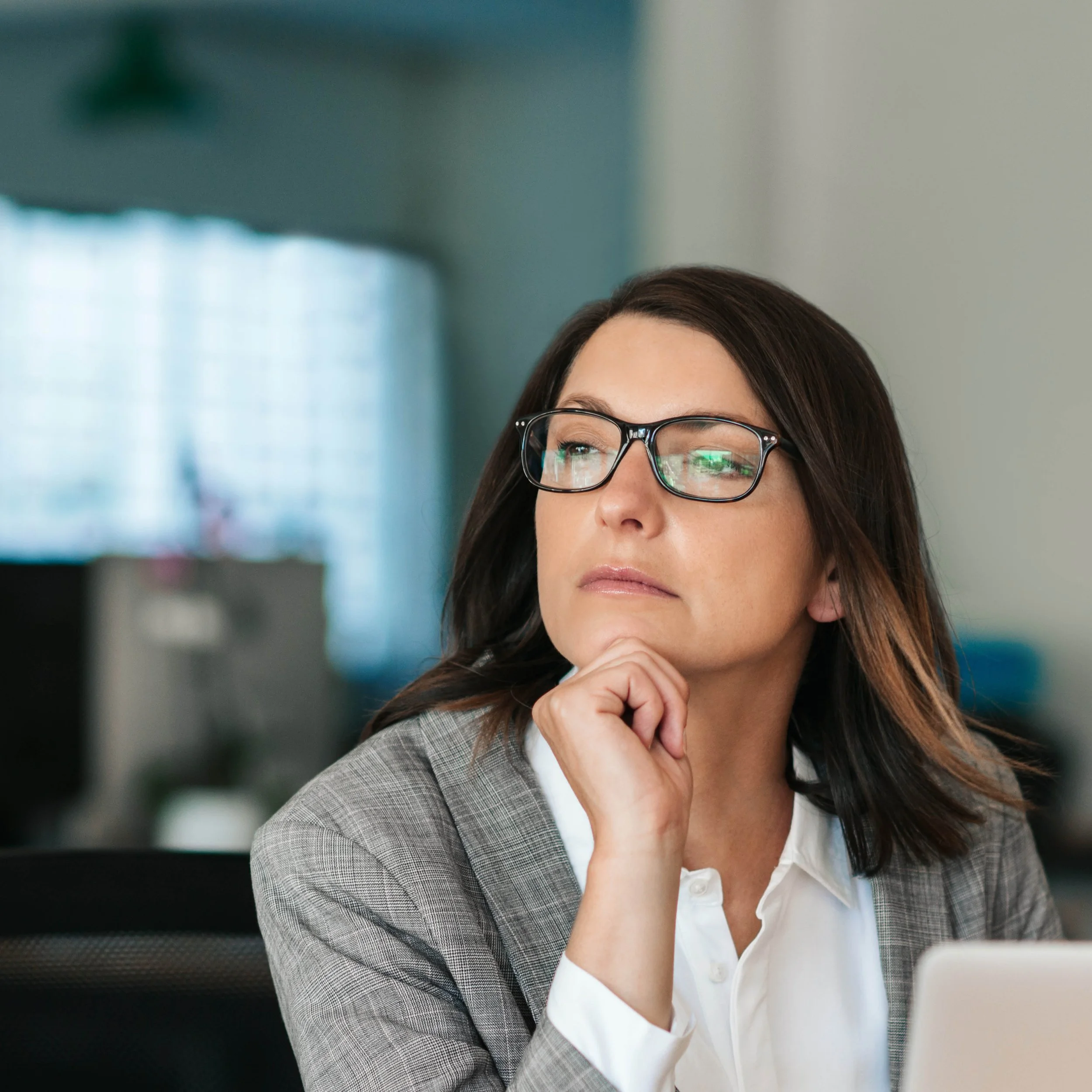 Leader reflecting during emotional intelligence coaching session.