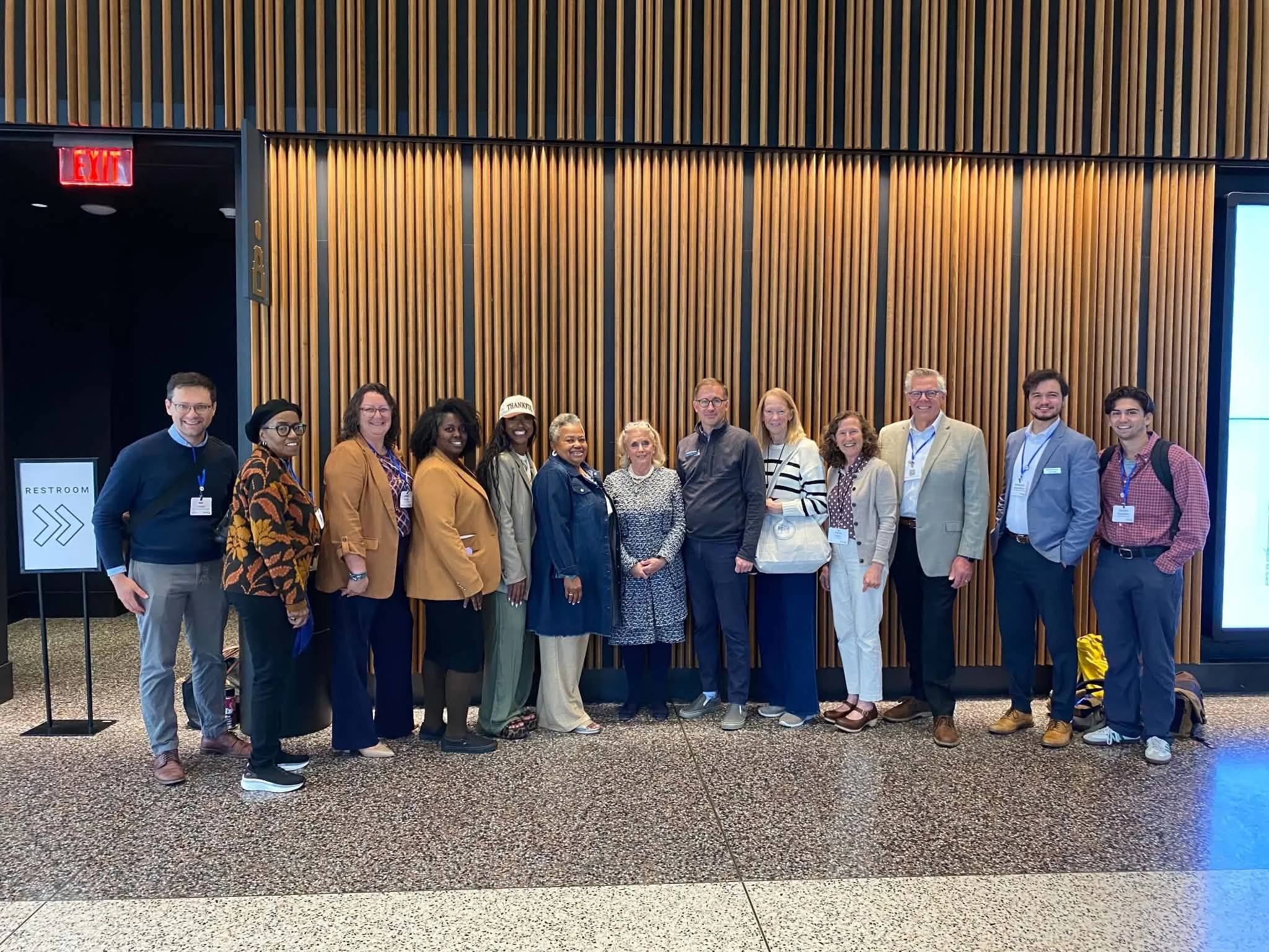 A large group of people with Representative Debbie Dingell.