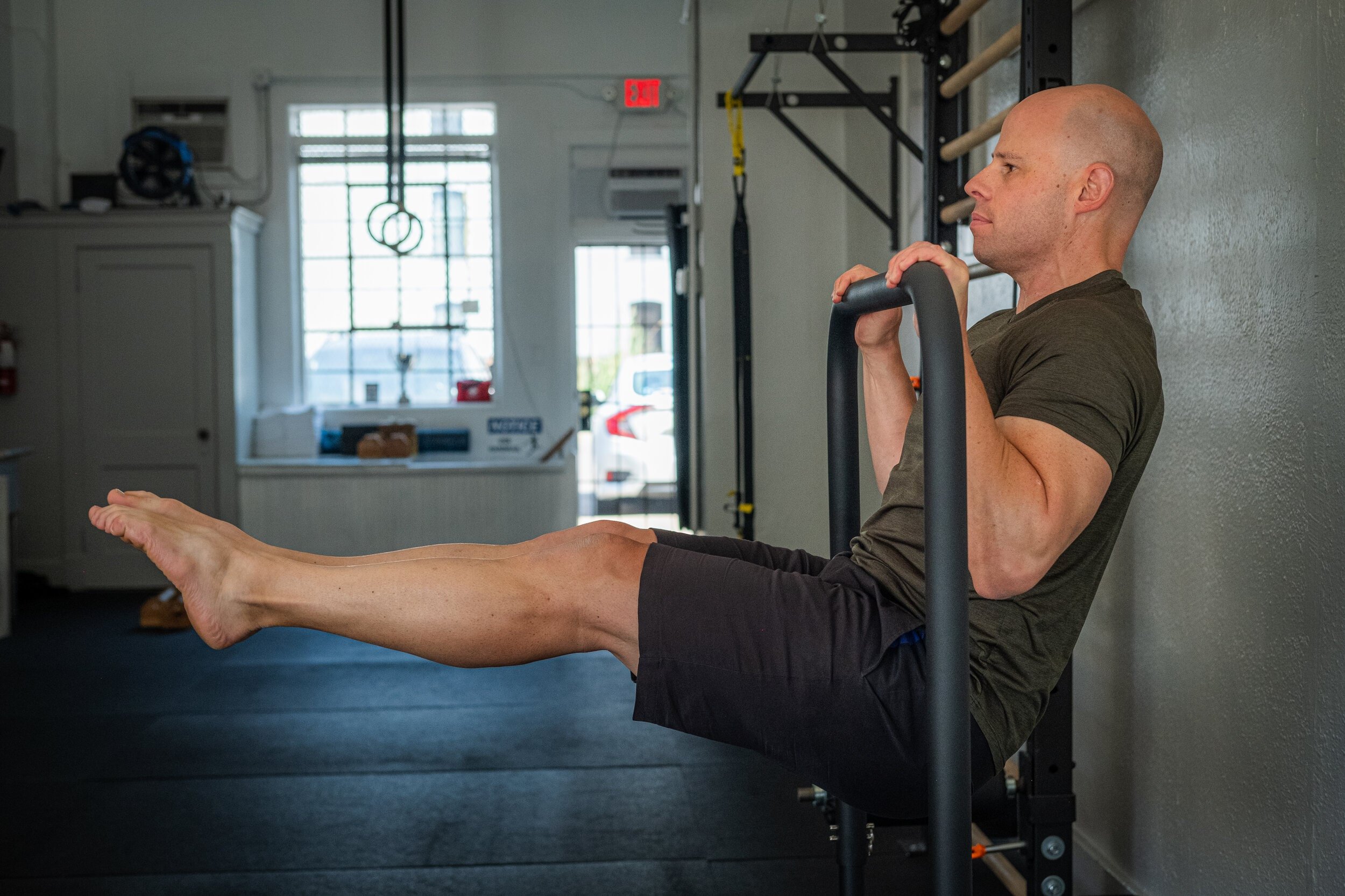 male personal trainer pull up