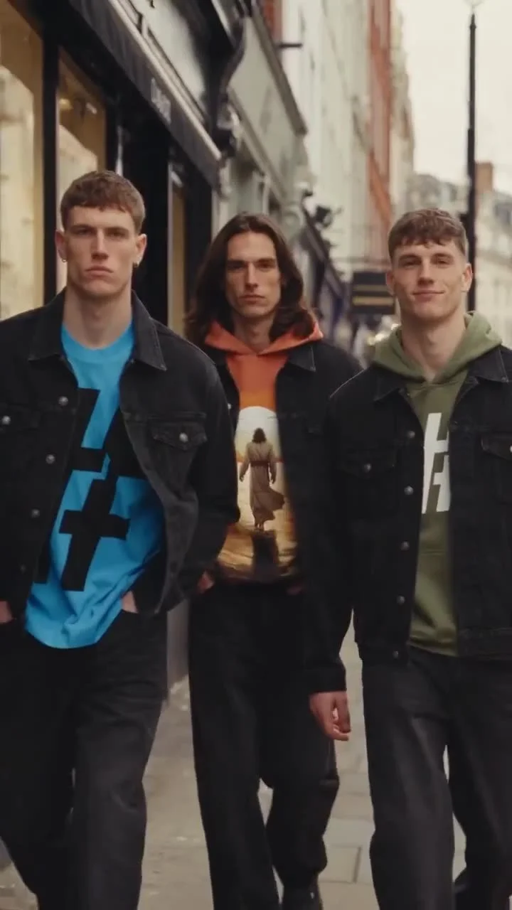 Three friends walking down a city street in Hashtag God pieces