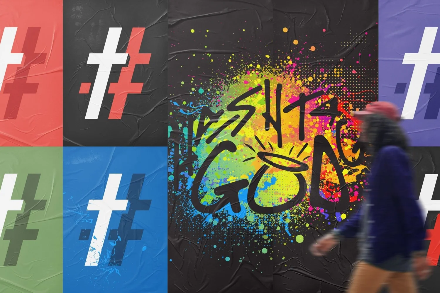 A street wall of Hashtag God posters with a person walking past
