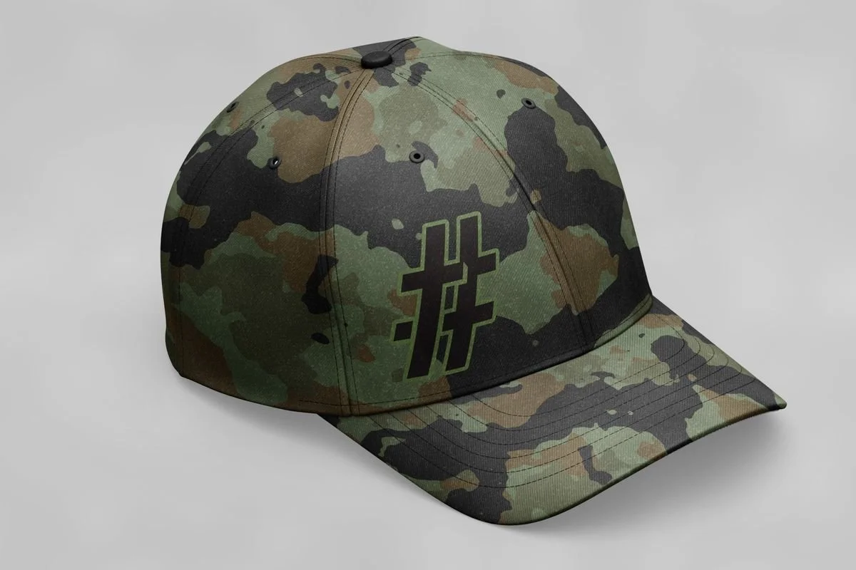 Camo cap with a black # cross mark