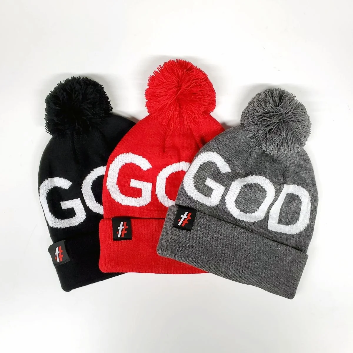 Black, red and grey GOD pom beanies