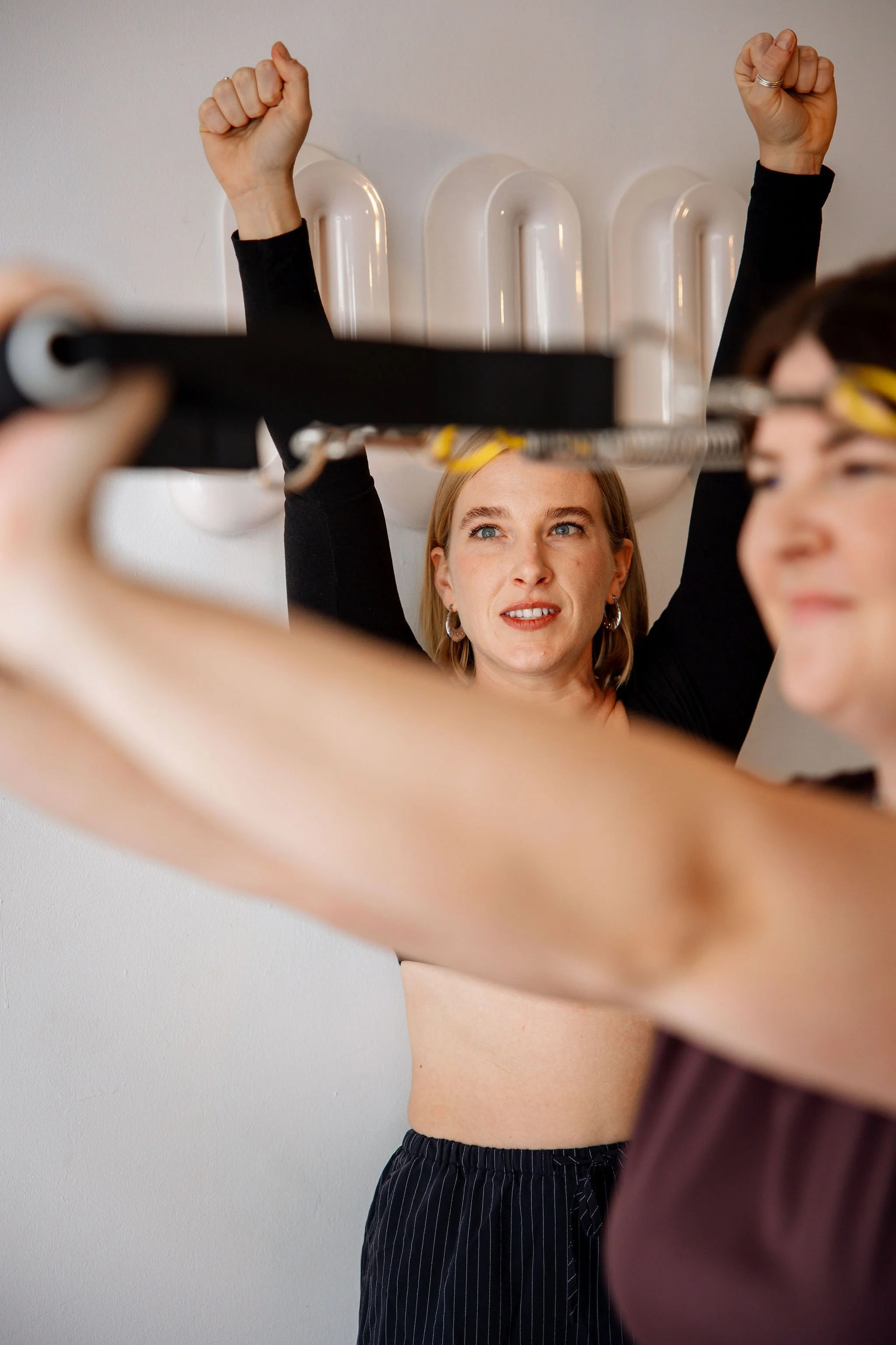 Susan working one-to-one with a client during a private Pilates session at Rosy Movement, 20 Smith St Collingwood