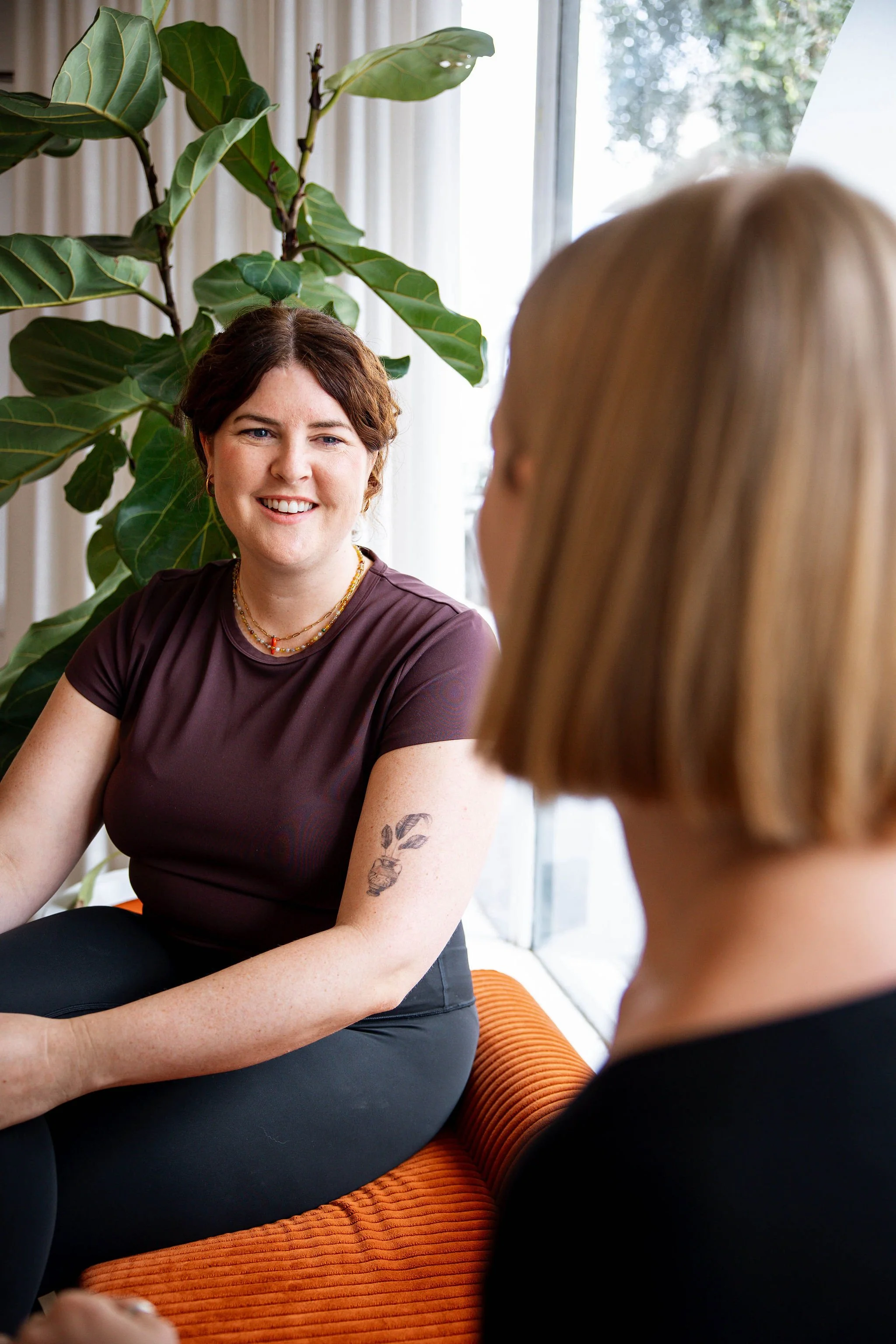Susan Dowd in consultation with a new client at Rosy Movement's Collingwood Pilates studio