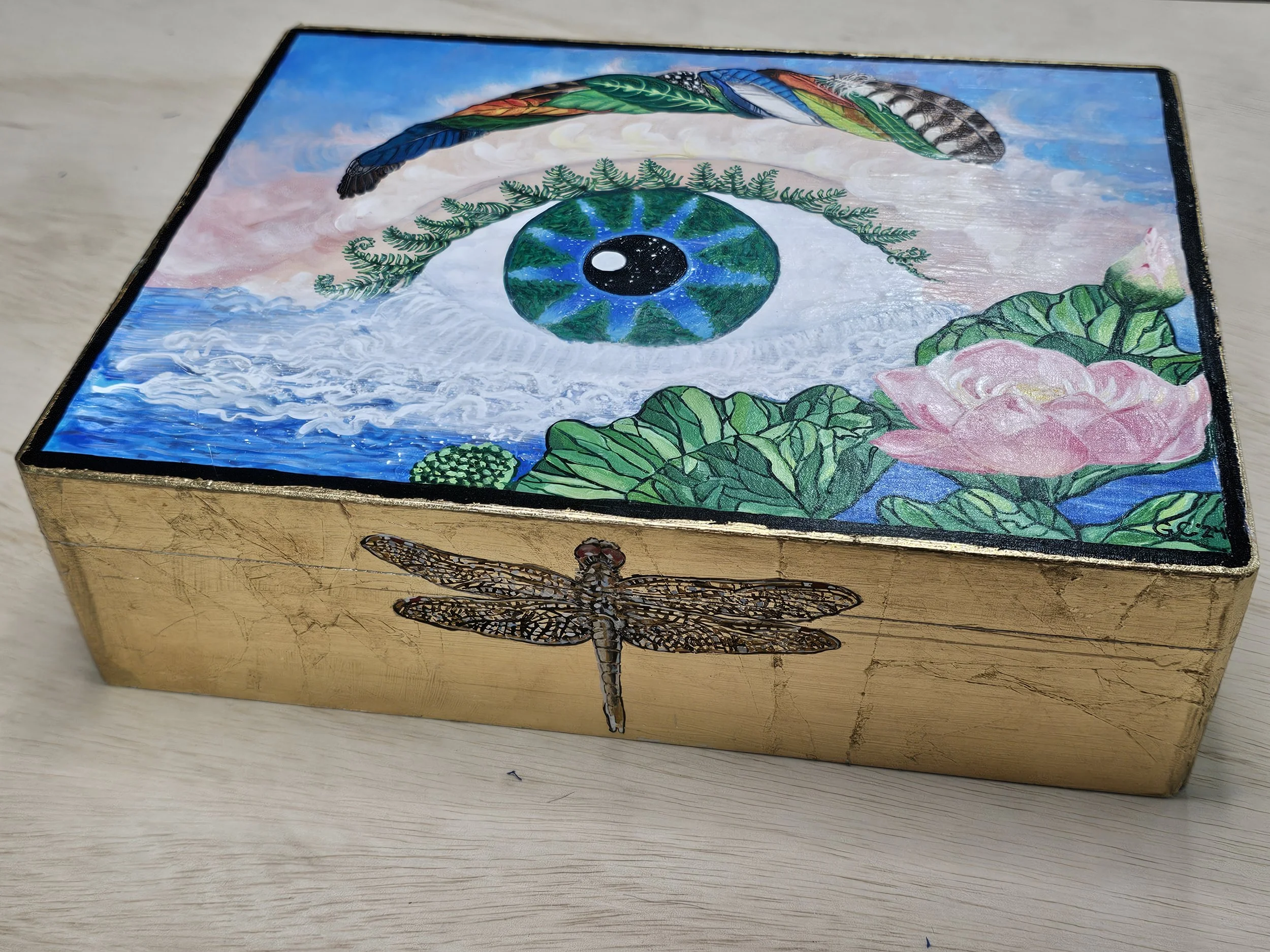 Nature's eye, gouache on wooden box with gold leaf, 2024