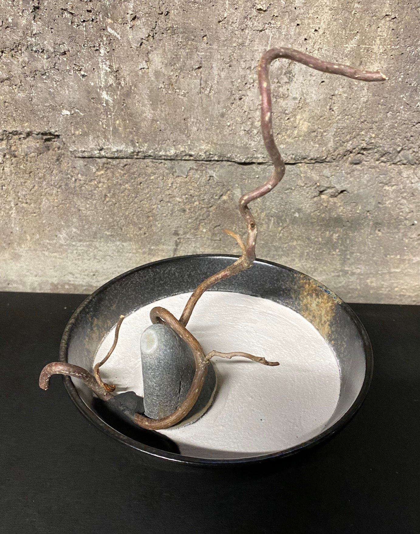 Beach Rock with Twisted Twig in Vessel