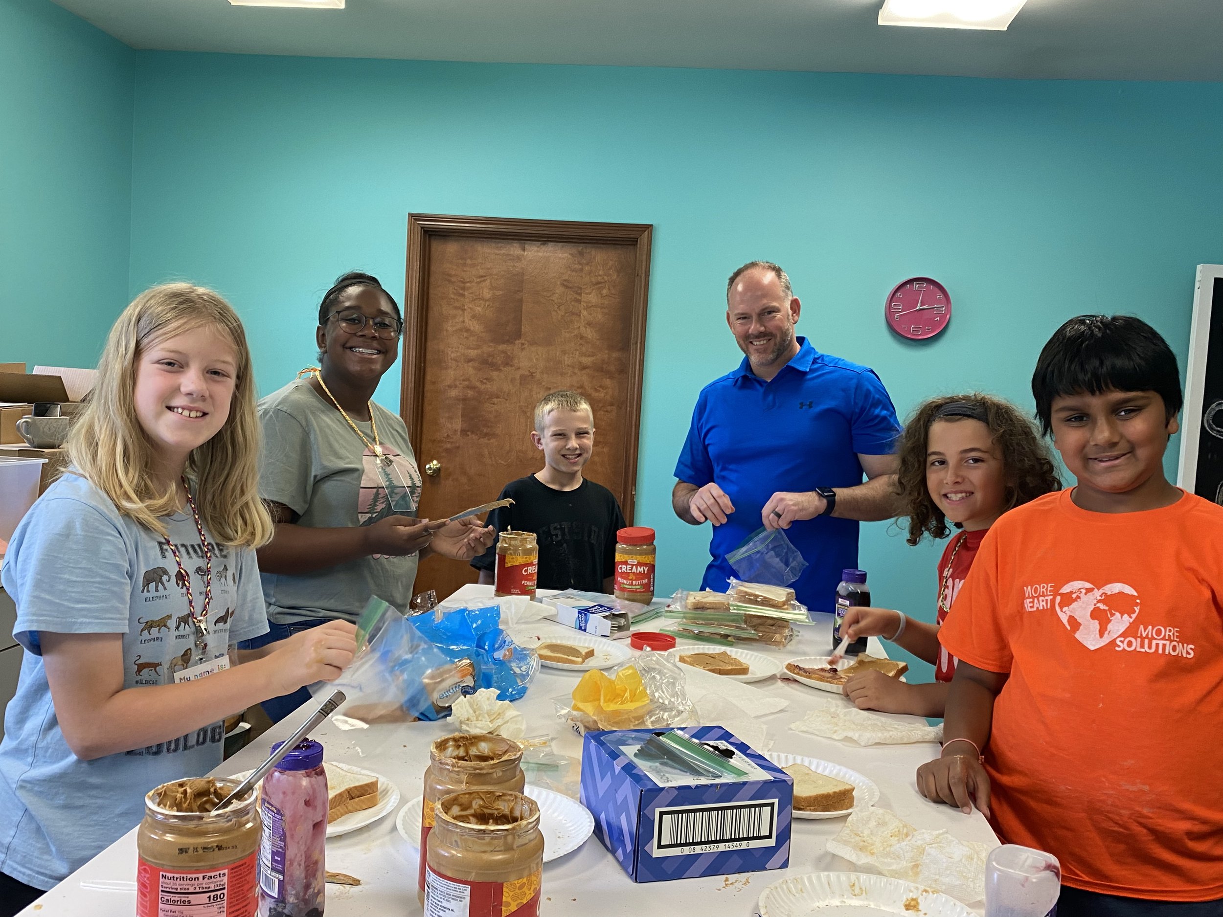 01 Camp Give Making PBJ for Shelter House NKY.jpeg